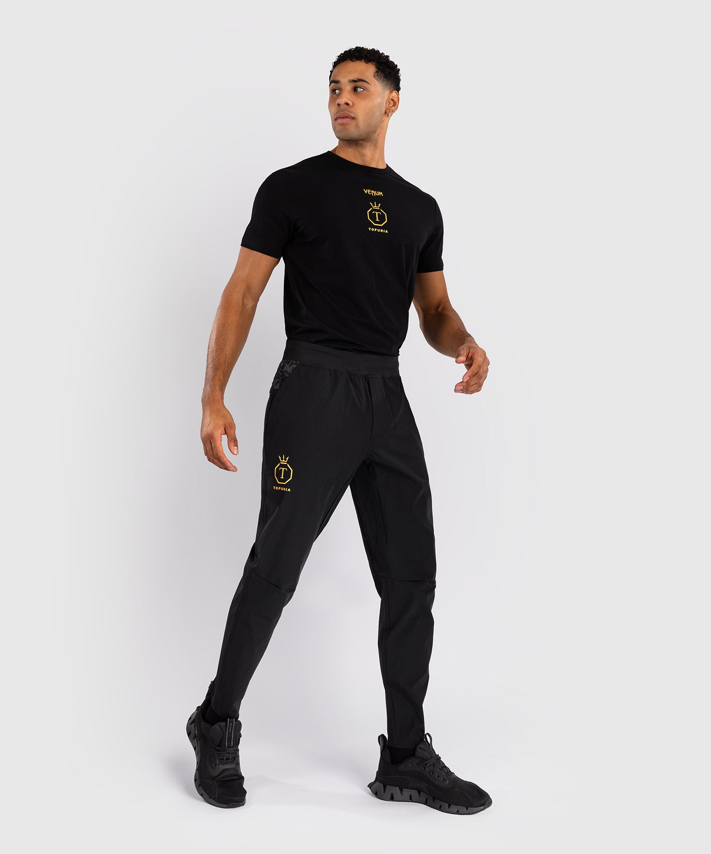 Venum x Topuria Unmatched Edition Pantalones de chándal - Negro/Dorado