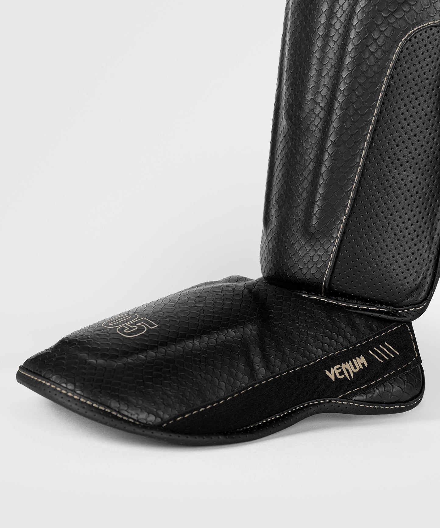 Protège-tibias Venum Impact Evo Scales – Noir