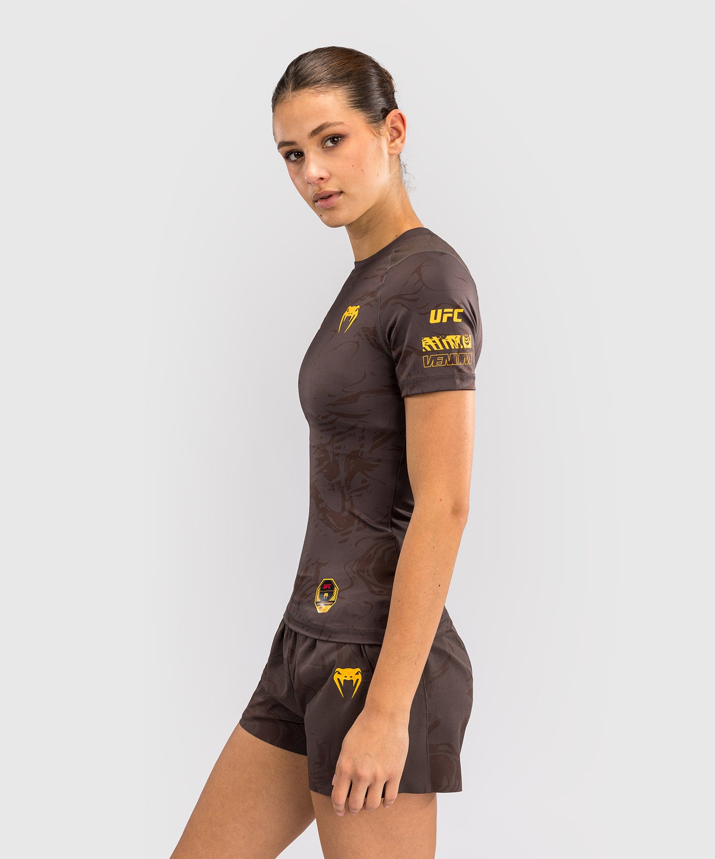 UFC Fusion by Venum Fight Week Damen Performance Kurzarm Rashguard - Solid Erdiges Braun