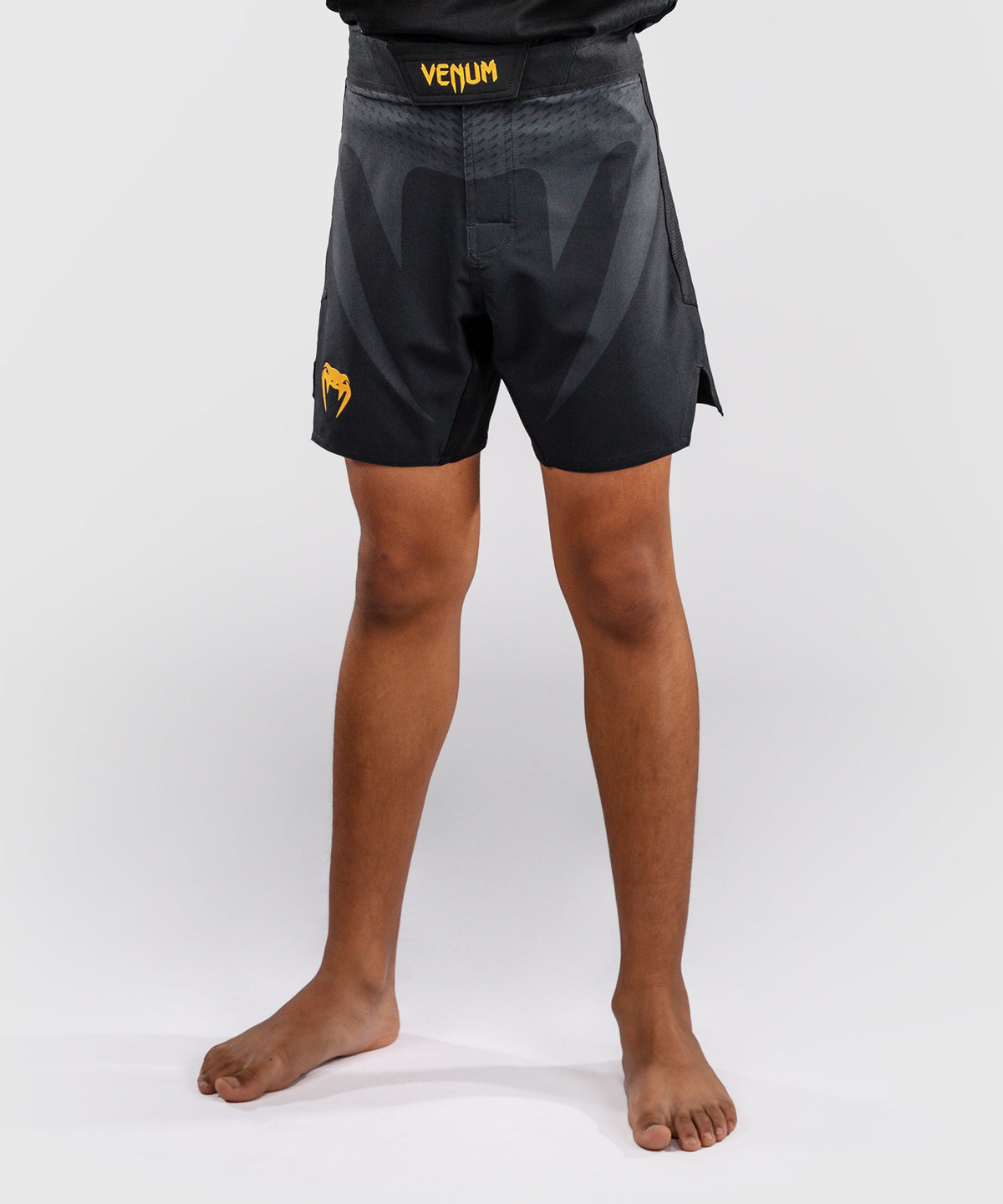 Venum Attack Fightshorts para niños - Negro/Dorado