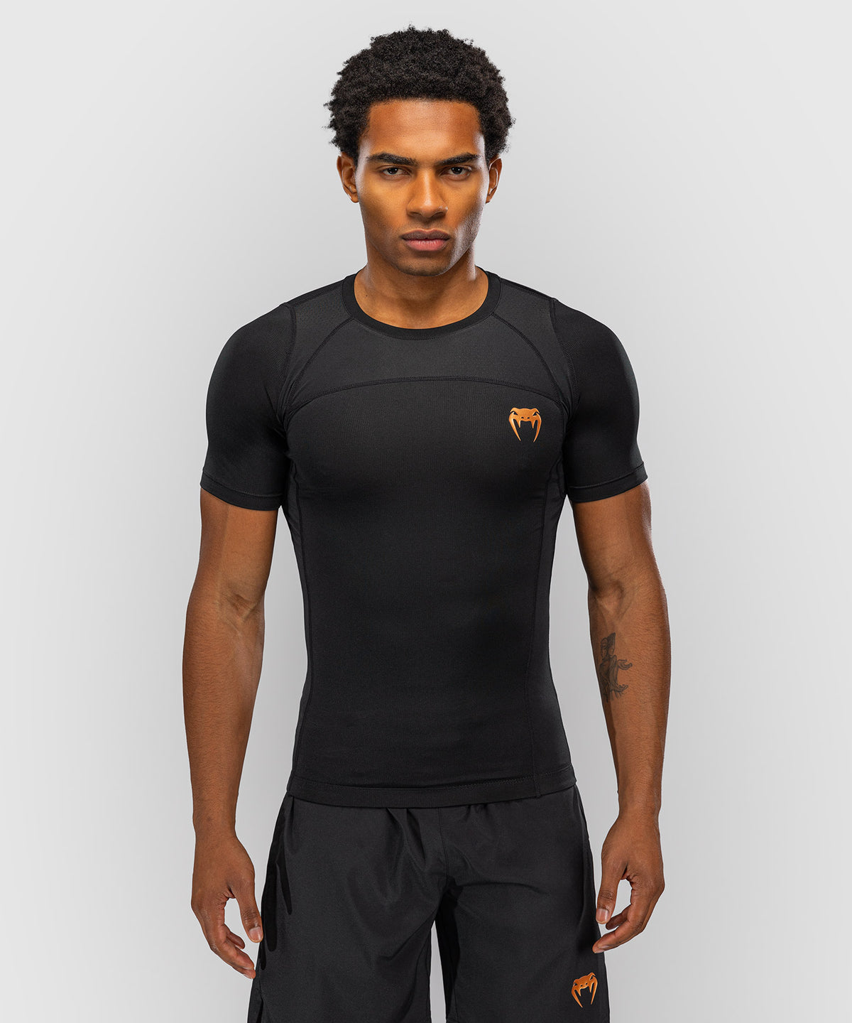 Venum G-Fit Revolution Rashguard de manga corta - Negro/Cobre