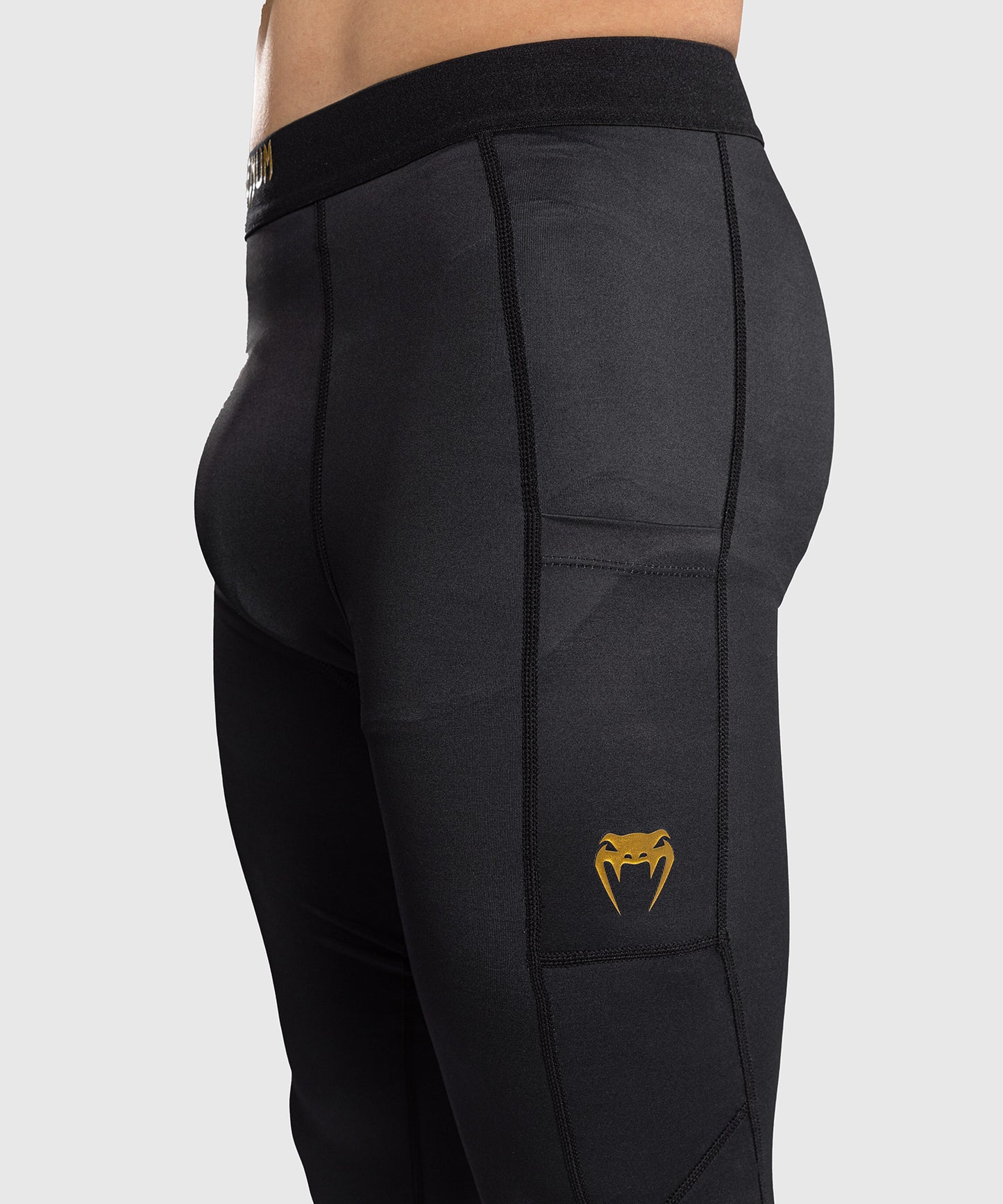 Venum Streamline Spats – Nero/Oro
