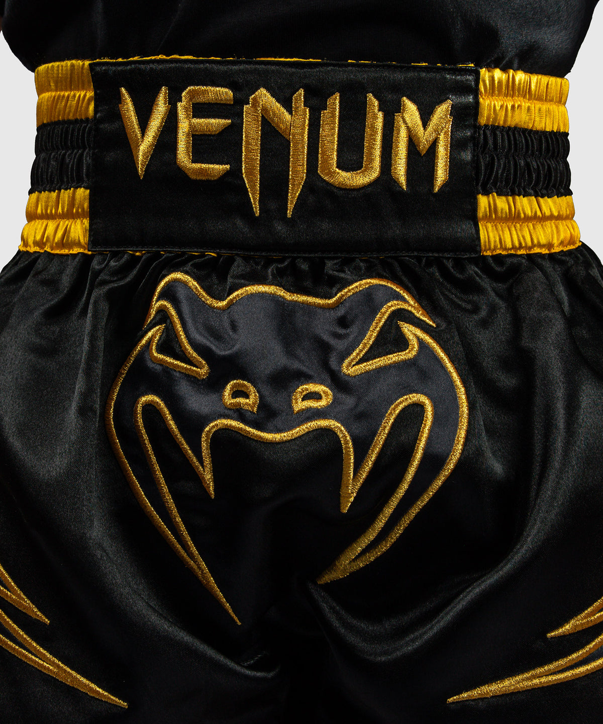 Venum Bangkok Fury Pantalón corto de Muay Thai para niños - Negro/Dorado