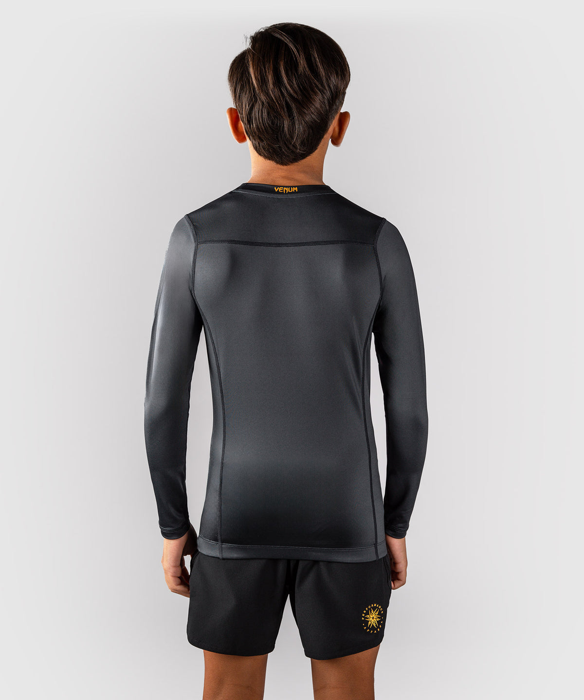 Venum Attack Rashguard de manga larga para niños - Negro/Dorado