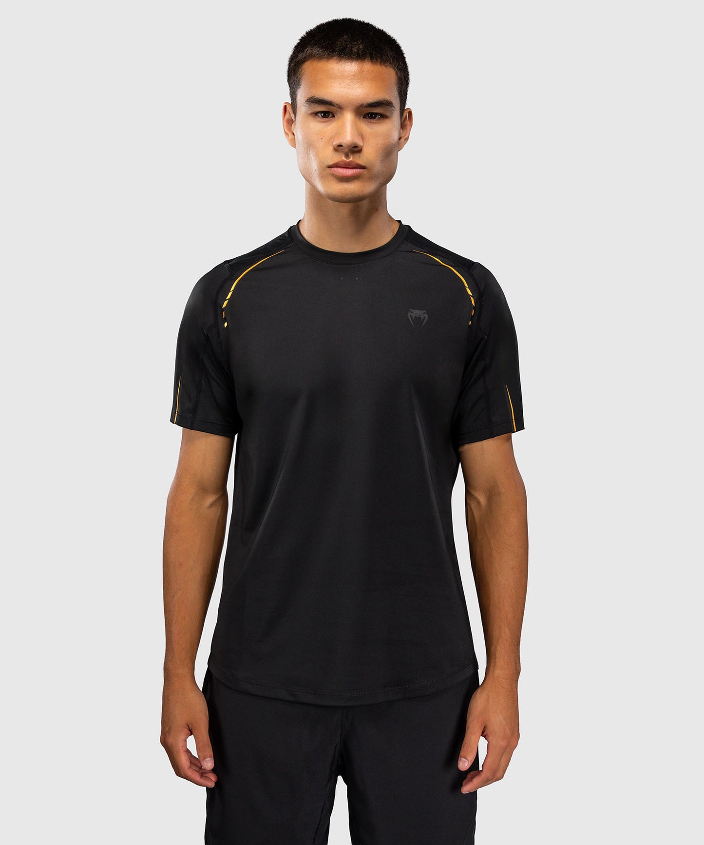 Venum G-Core Camiseta Dry Tech - Negro/Oro