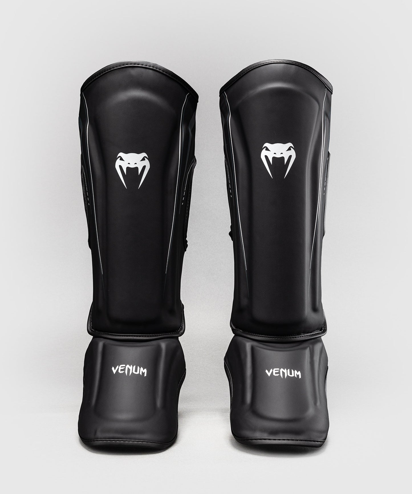 Venum Streamline Paratibie – Nero/Bianco