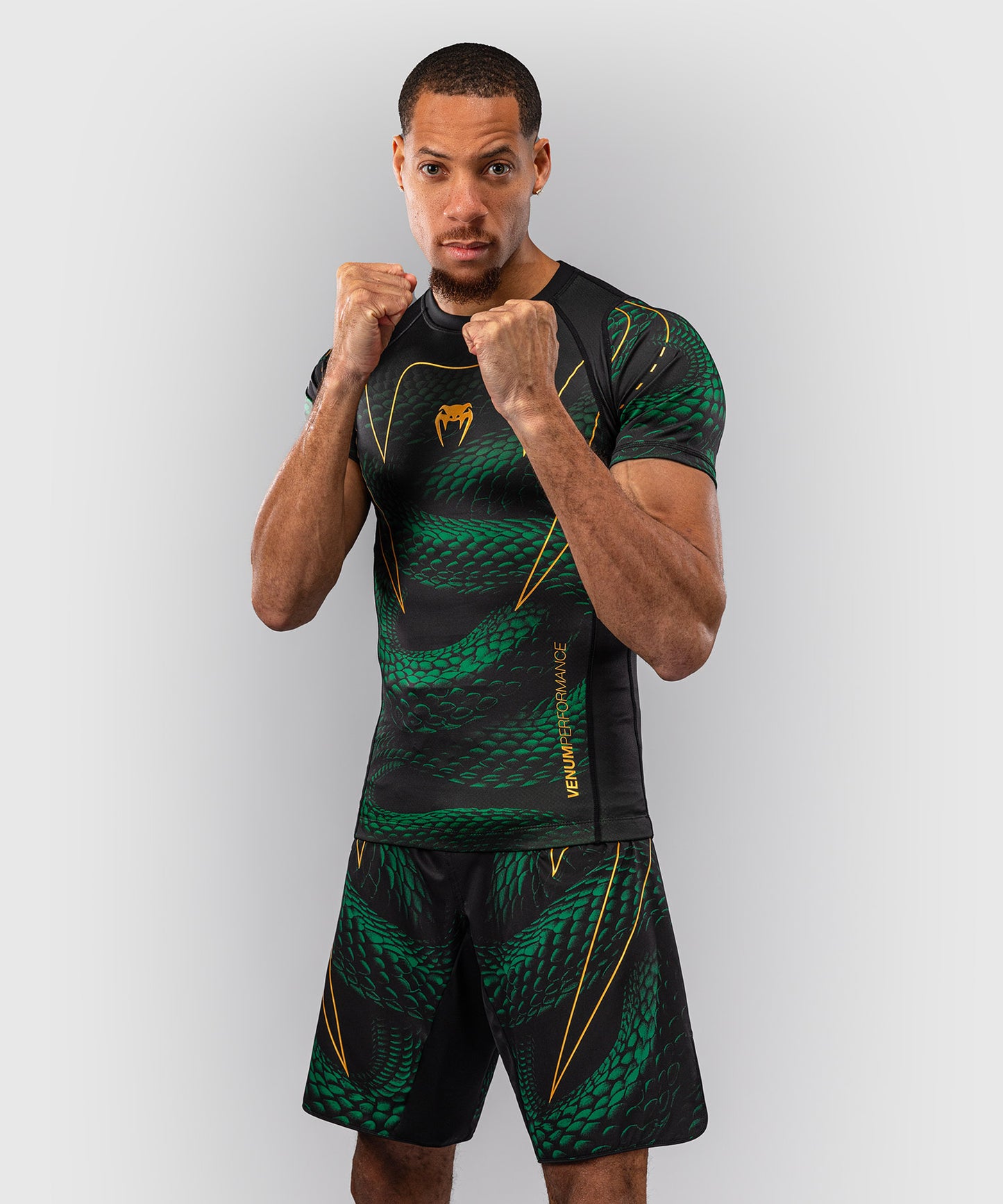 Venum Matupa Kurzarm Rashguard - Schwarz/Grün/Gold