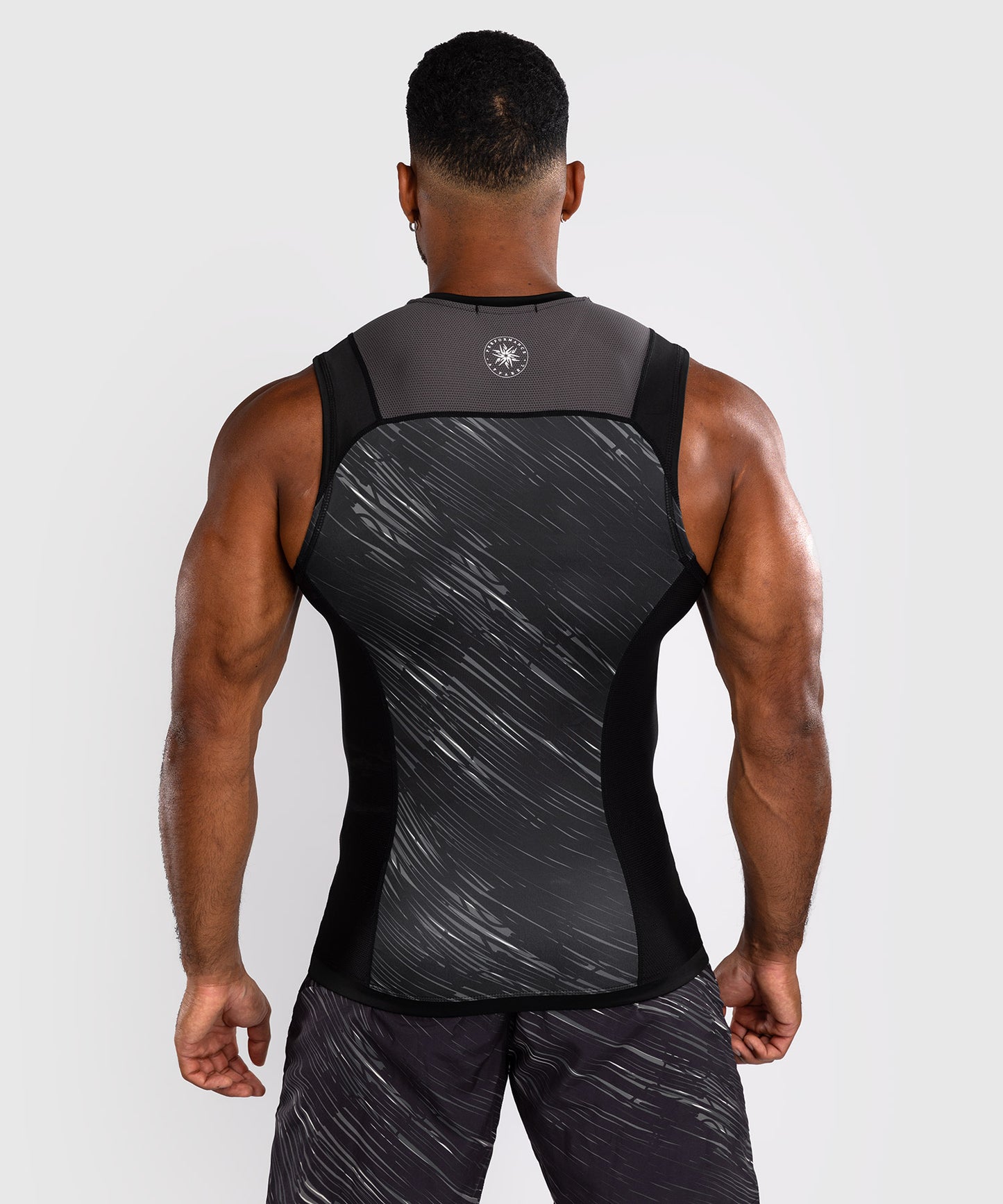 Venum Rapid Rashguard sin Manga - Negro/Gris Tormenta