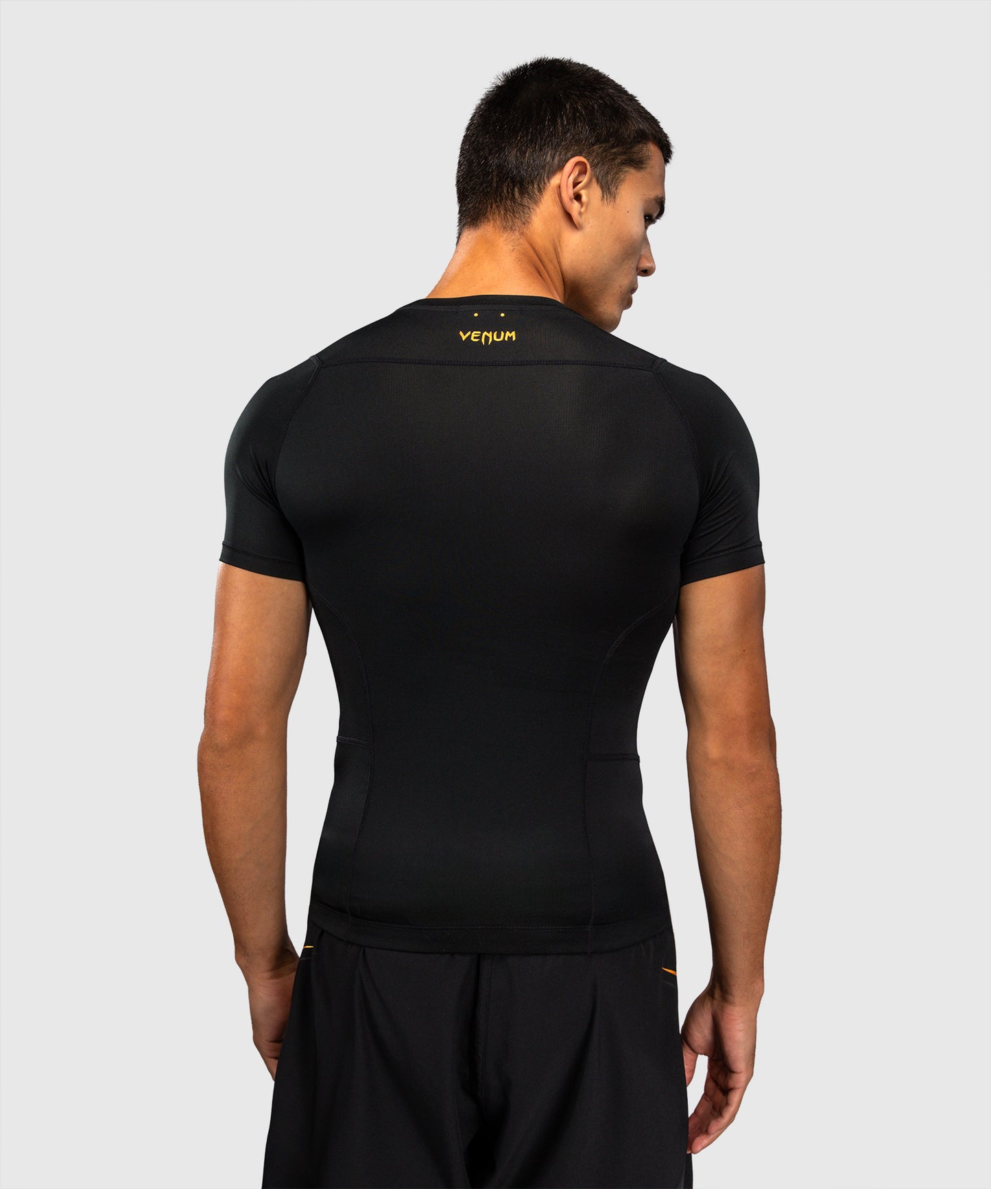 Venum G-Core Rashguard a Maniche Corte - Nero/Oro
