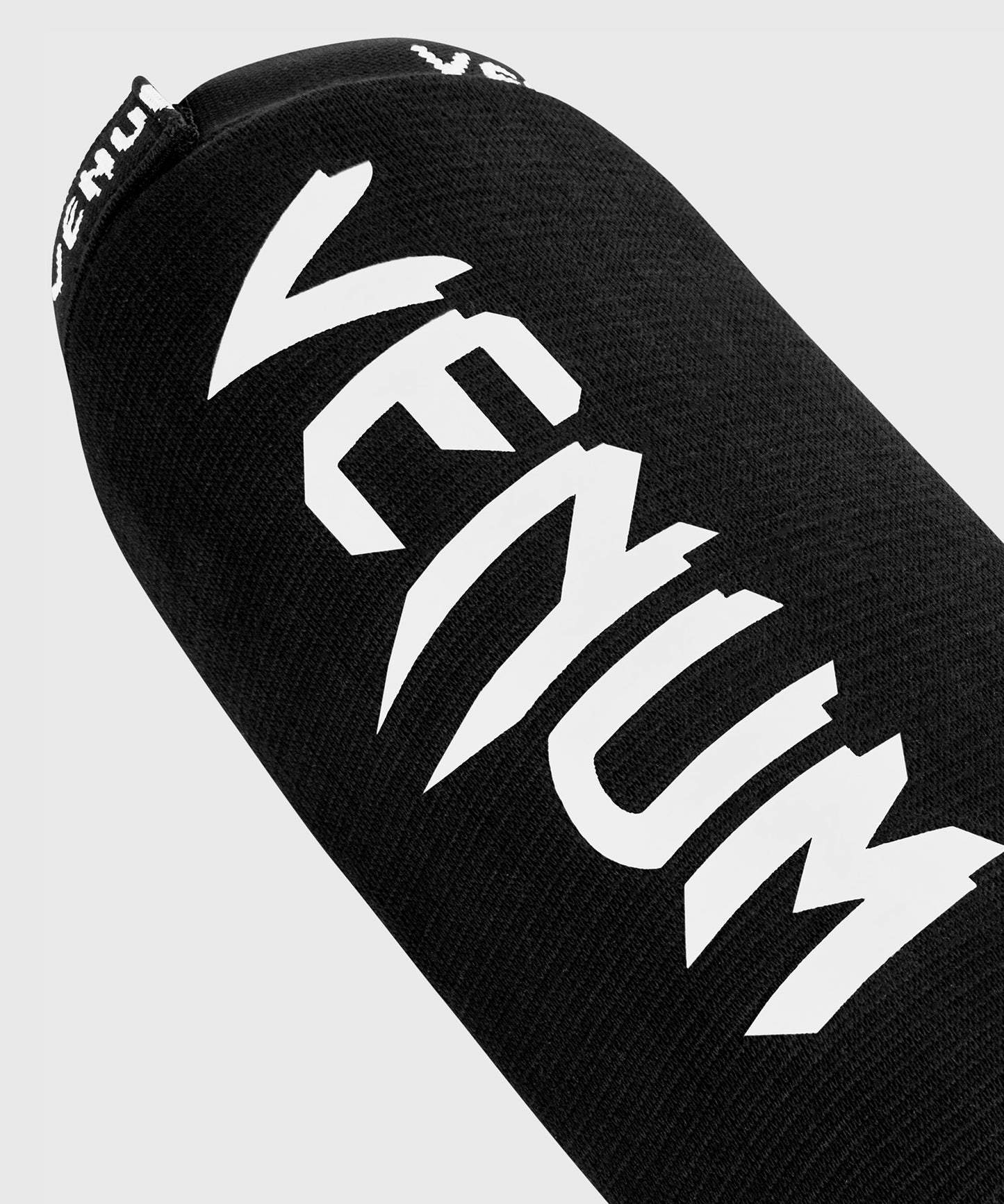 Venum Kontact Espinilleras – Negro/Blanco