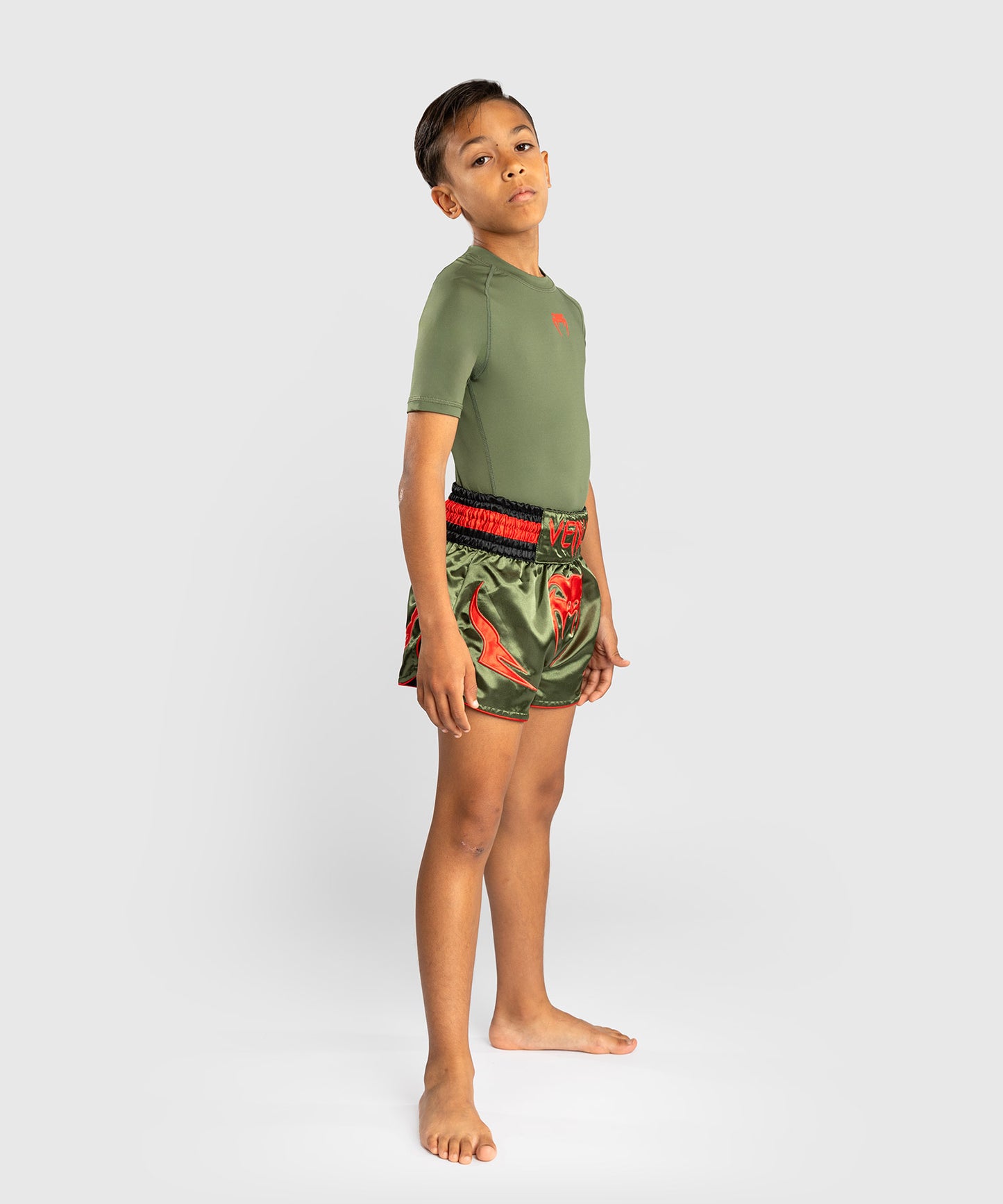 Venum Inferno Kinder Muay Thai Shorts - Armeegrün/Orange
