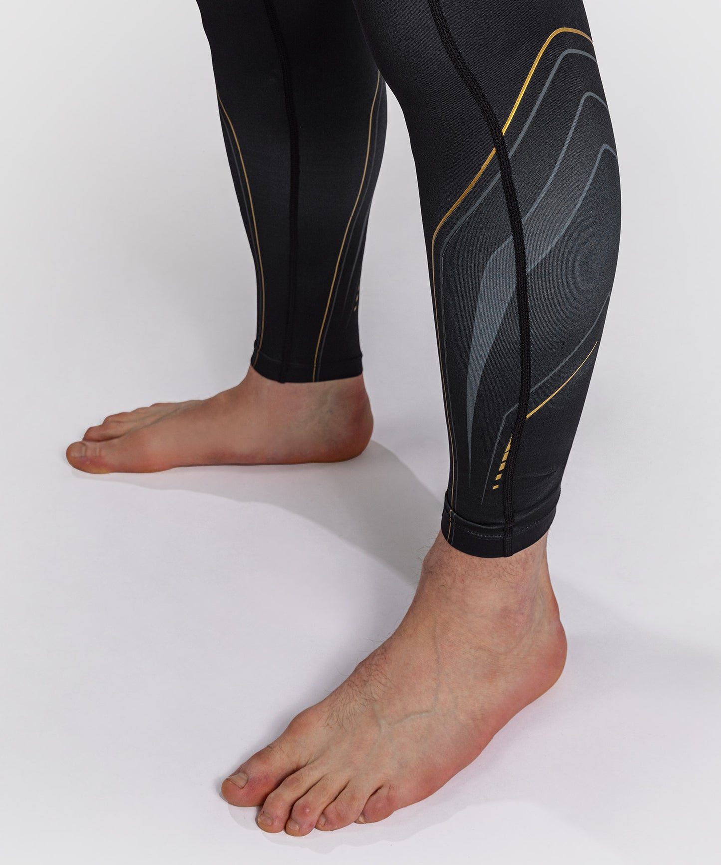 Venum Streamline Spats – Nero/Oro
