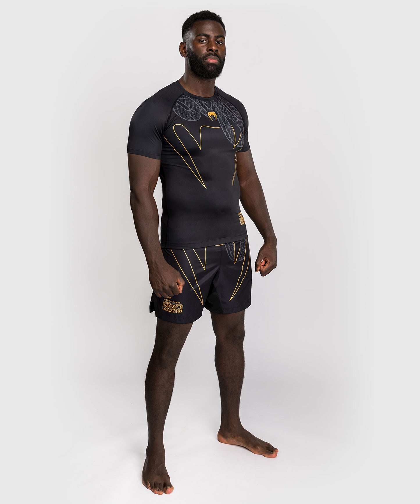 Venum Serpenti Kurzarm Rashguard – Schwarz/Silber/Gold