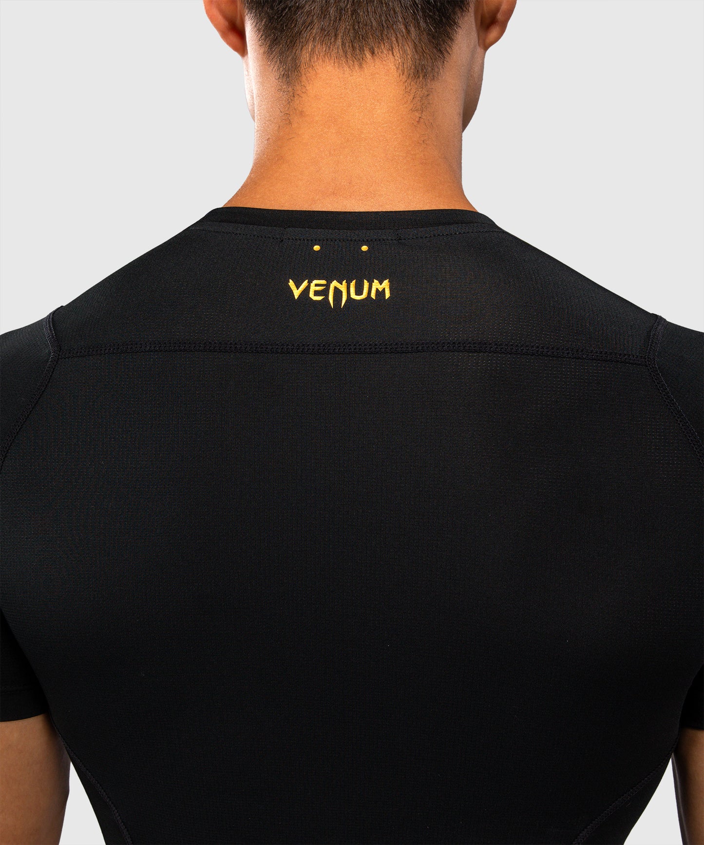 Venum G-Core Rashguard a Maniche Corte - Nero/Oro