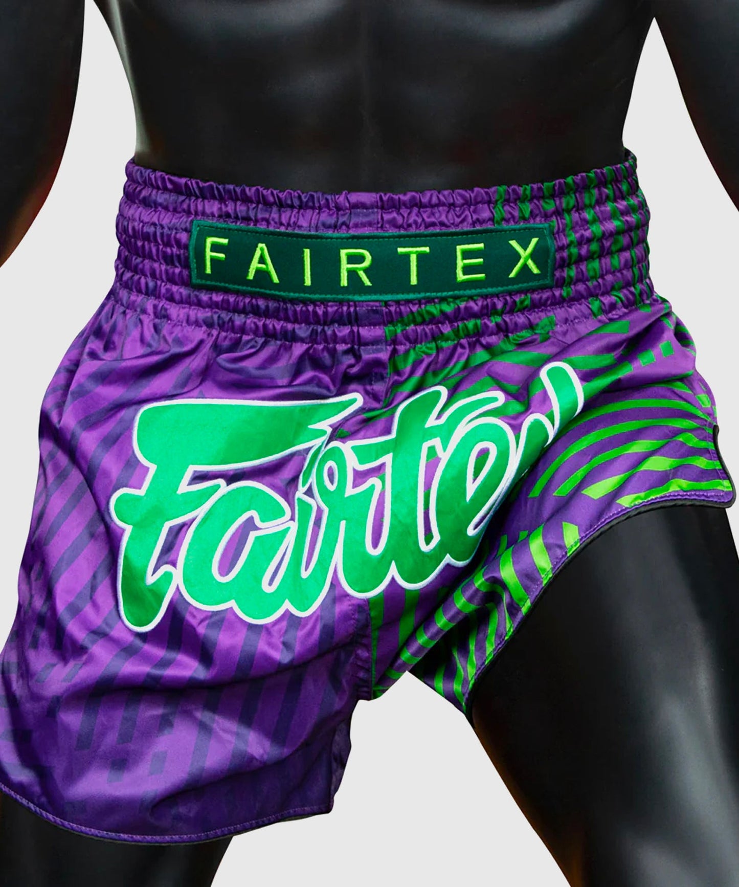 Fairtex Racer Pantalones de Muay Thai - Violeta/Verde