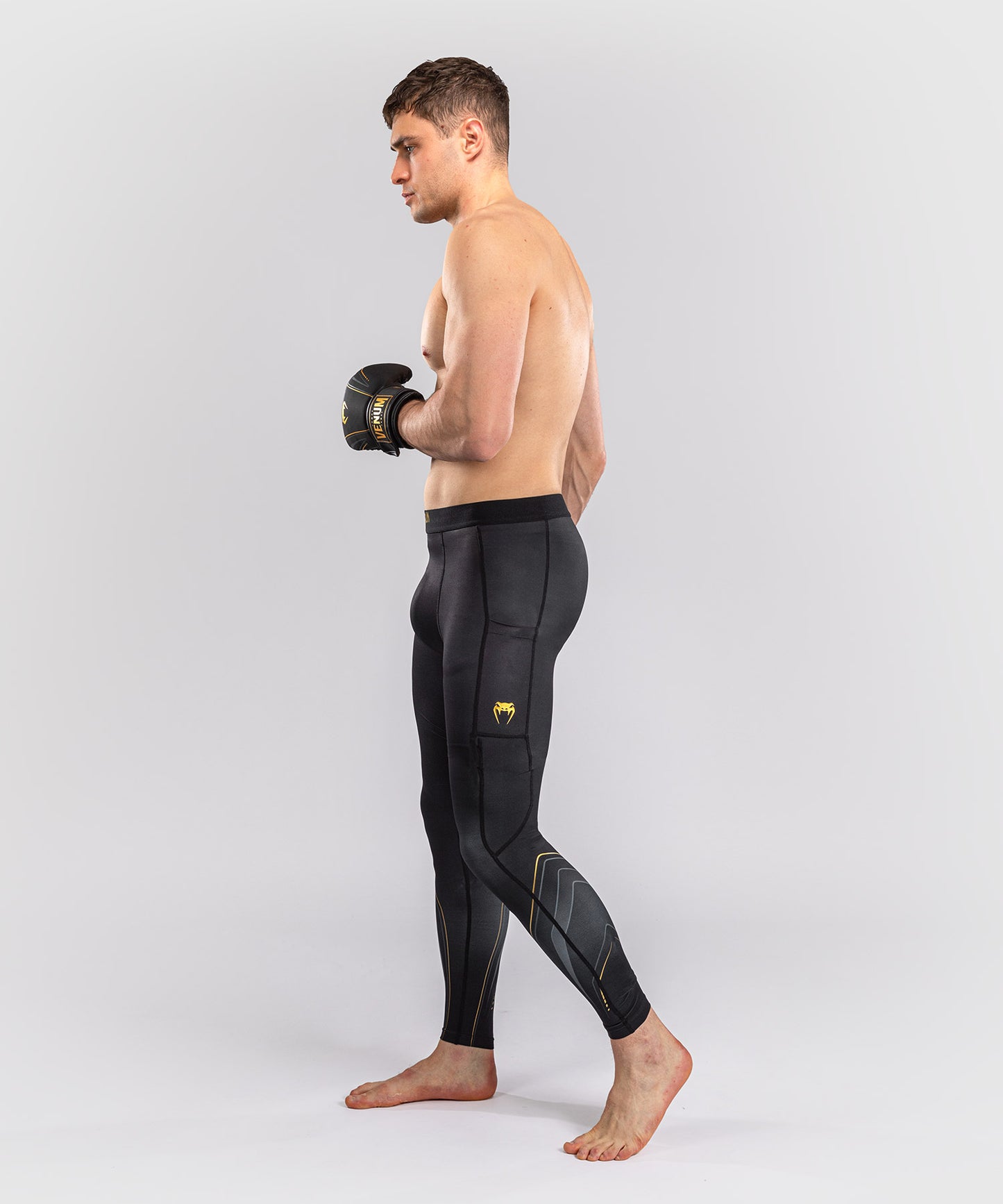 Venum Streamline Spats – Nero/Oro