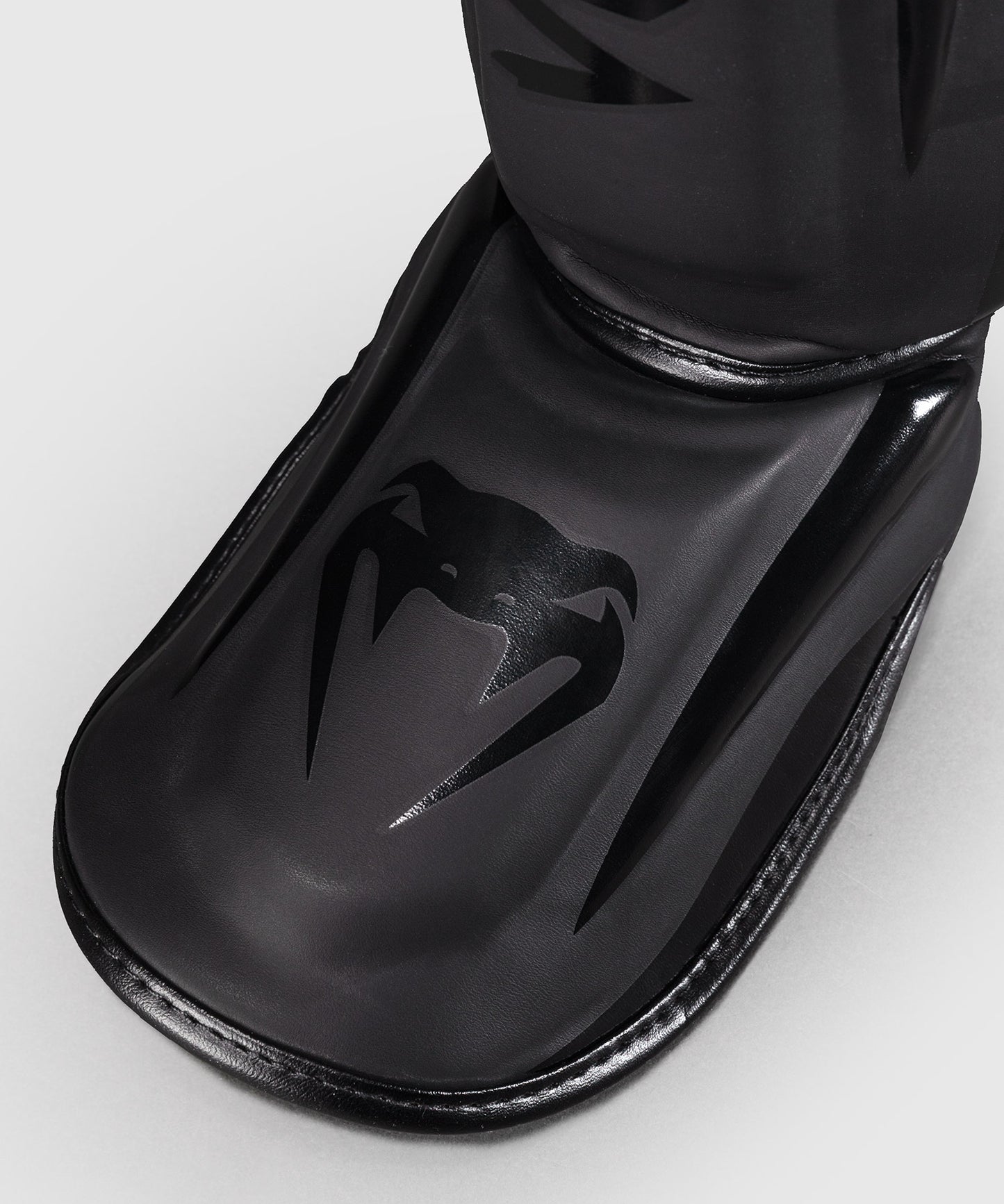 Espinilleras Venum Elite Standup - Negro Mate/Negro