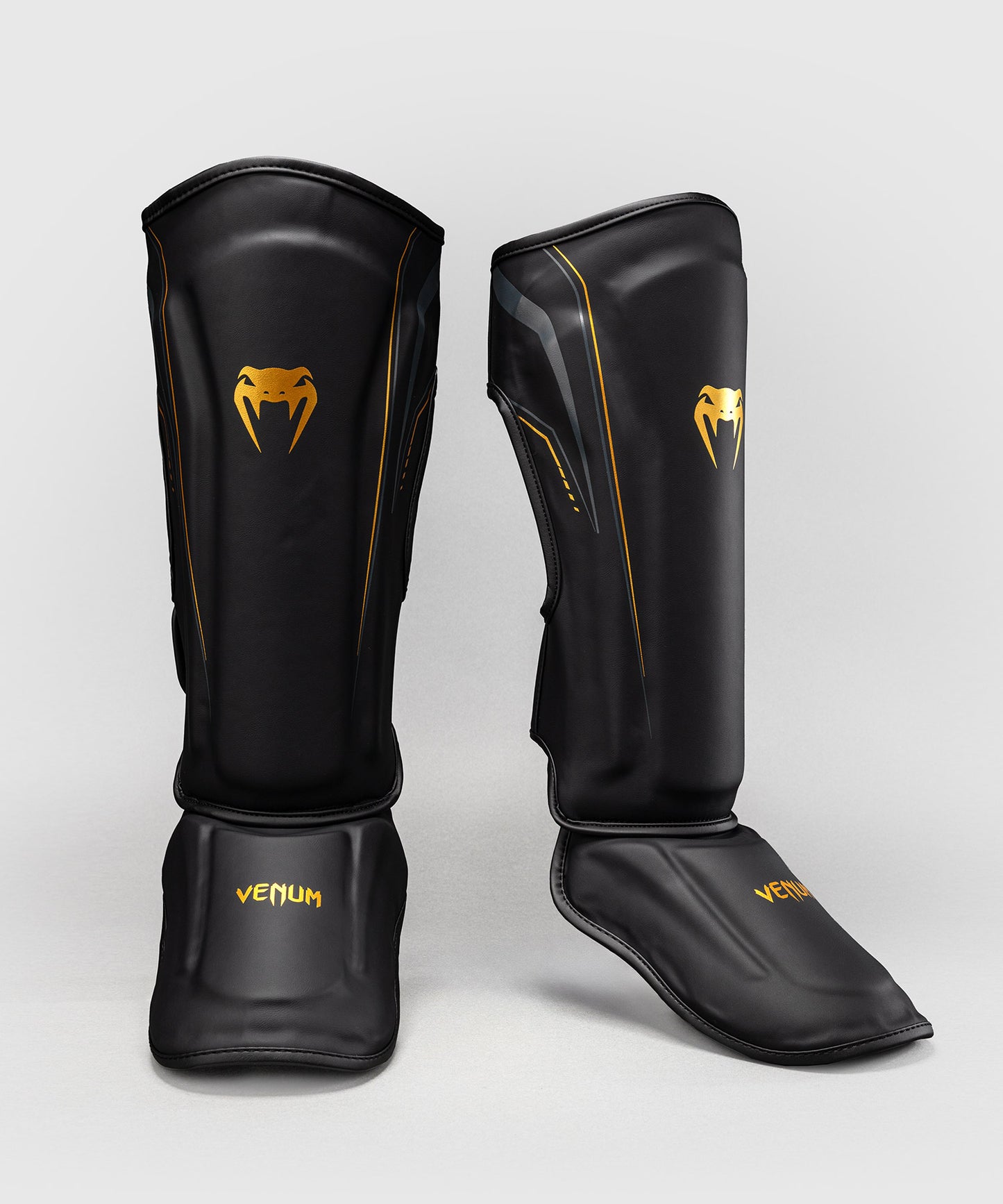 Protège-tibias Venum Streamline – Noir/Or