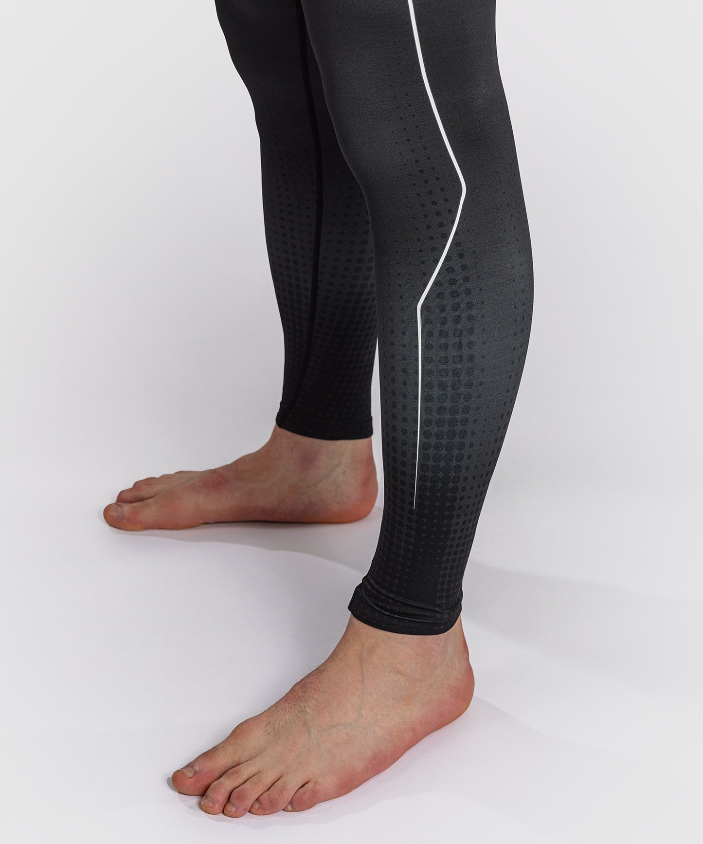 Venum Stealth Spats – Schwarz/Weiß