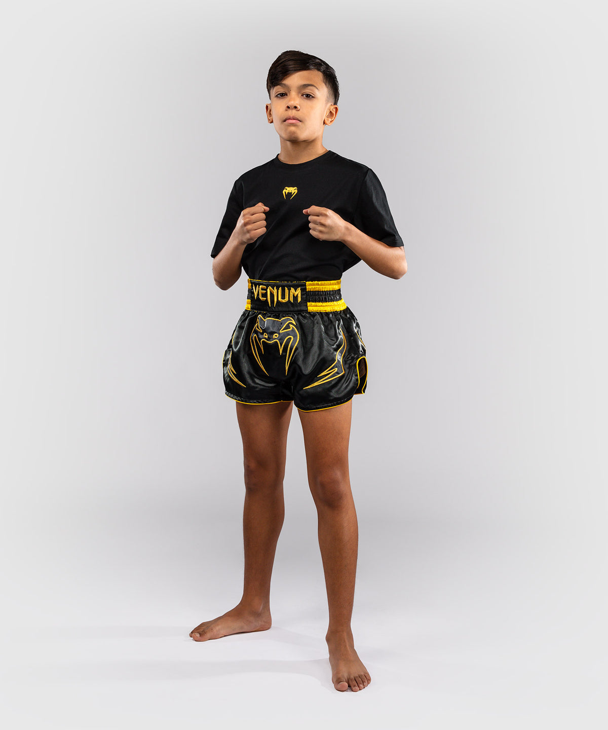 Venum Bangkok Fury Pantalón corto de Muay Thai para niños - Negro/Dorado