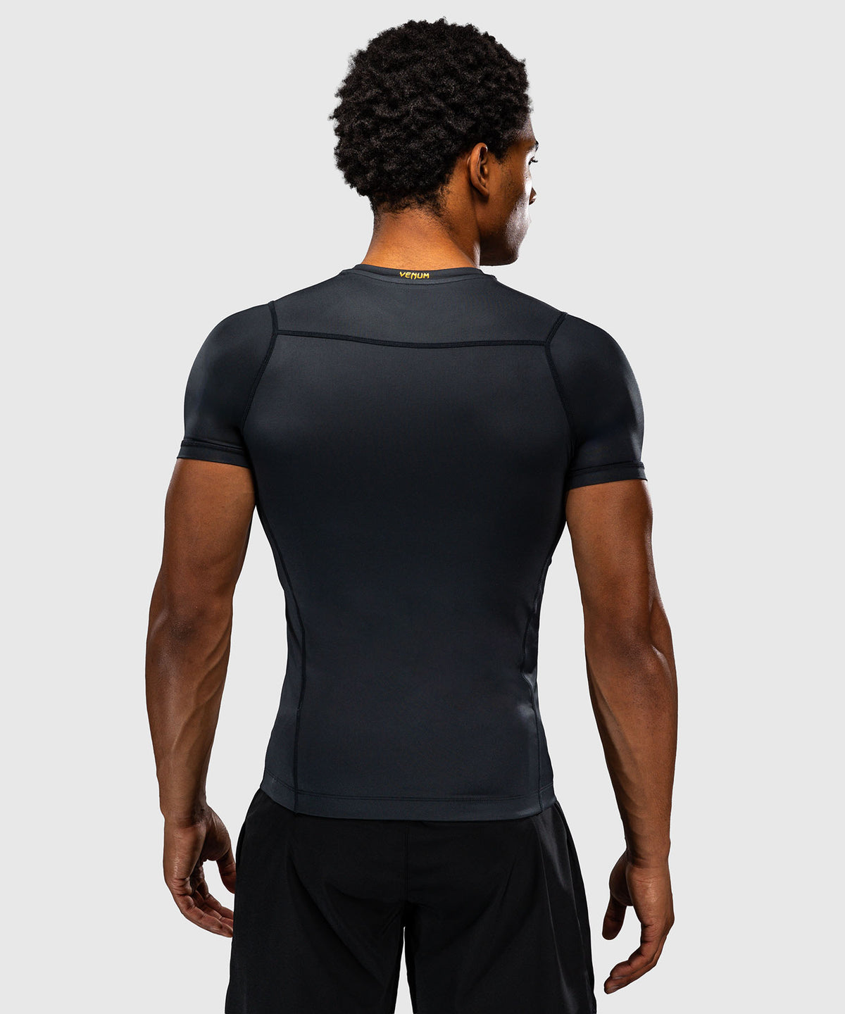 Venum Attack Kurzarm-Rashguard - Schwarz/Gold