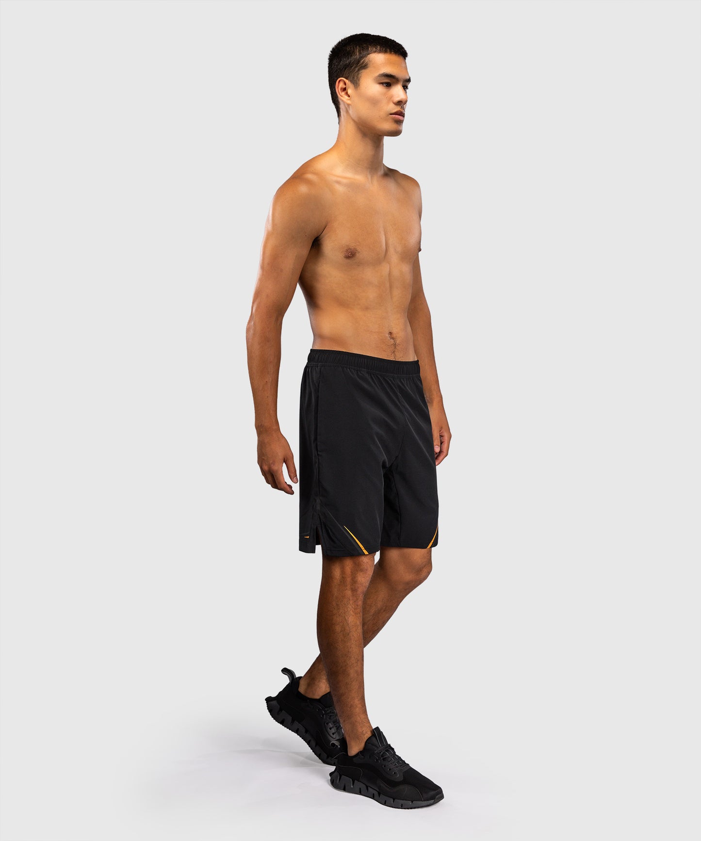 Venum G-Core Pantalón Corto de Entrenamiento - Negro/Oro