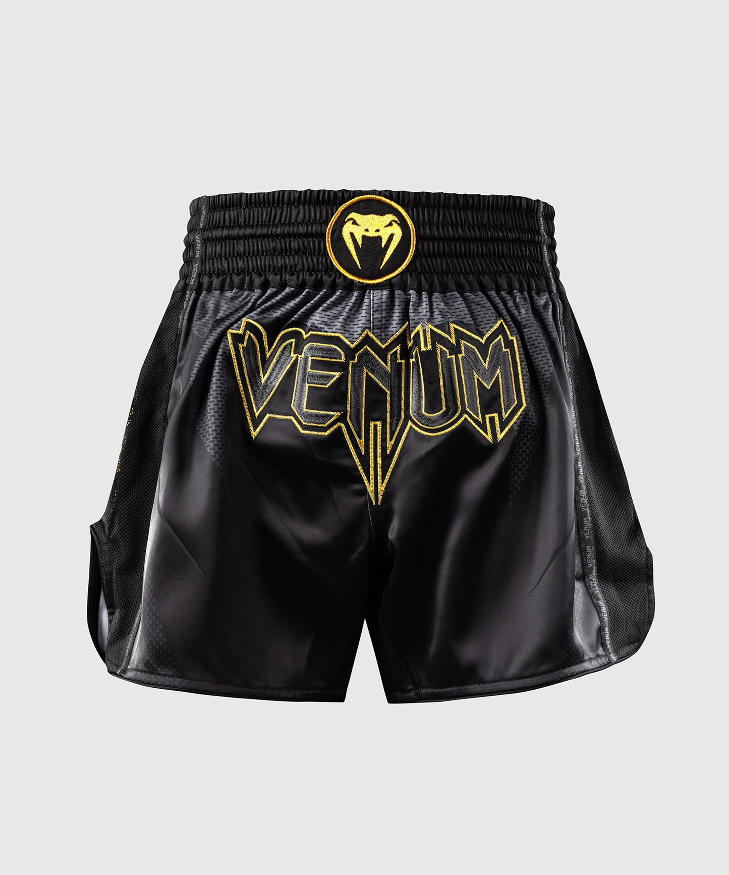 Venum G-Core Pantalón Corto de Muay Thai - Negro/Oro