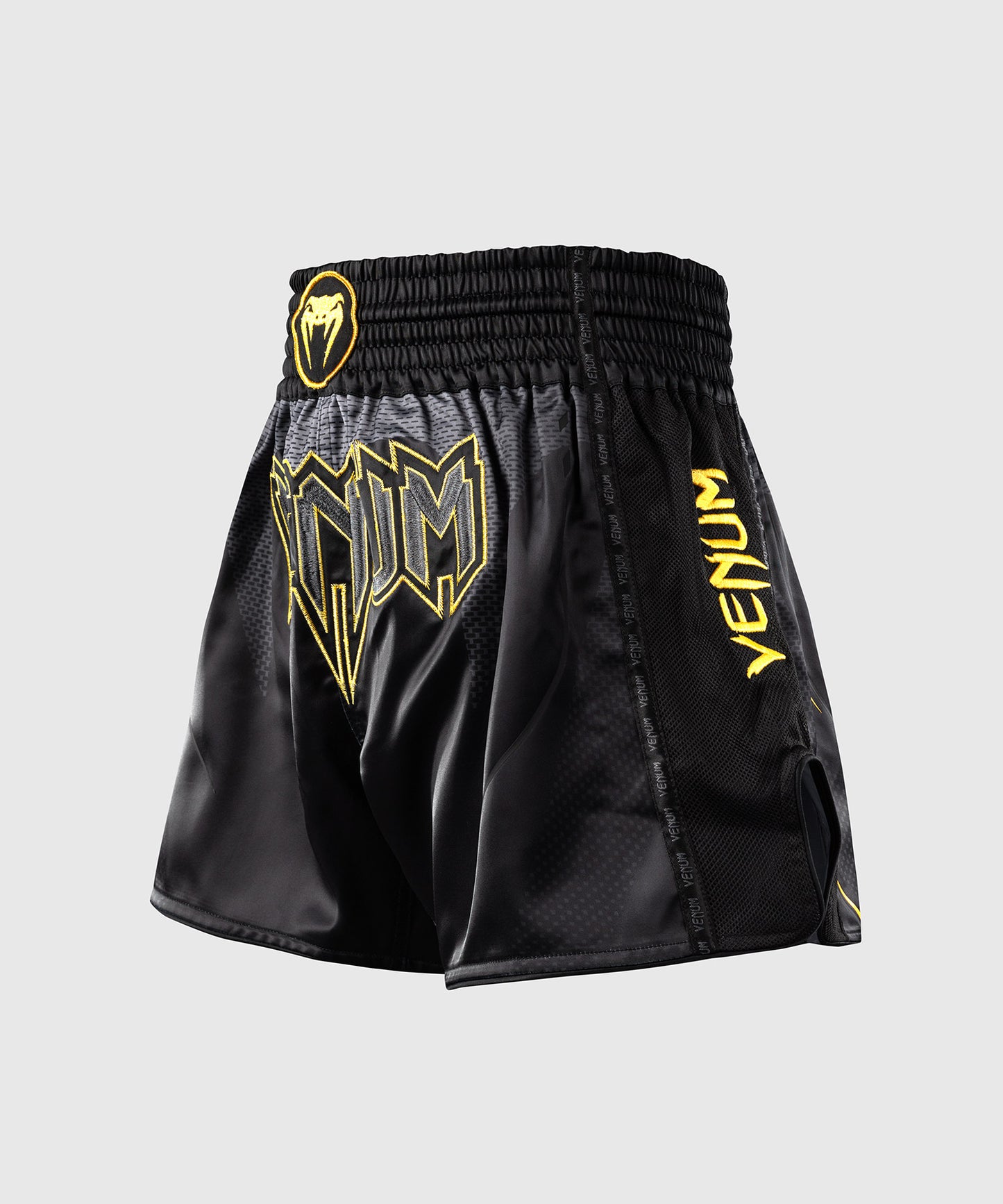 Venum G-Core Pantalón Corto de Muay Thai - Negro/Oro