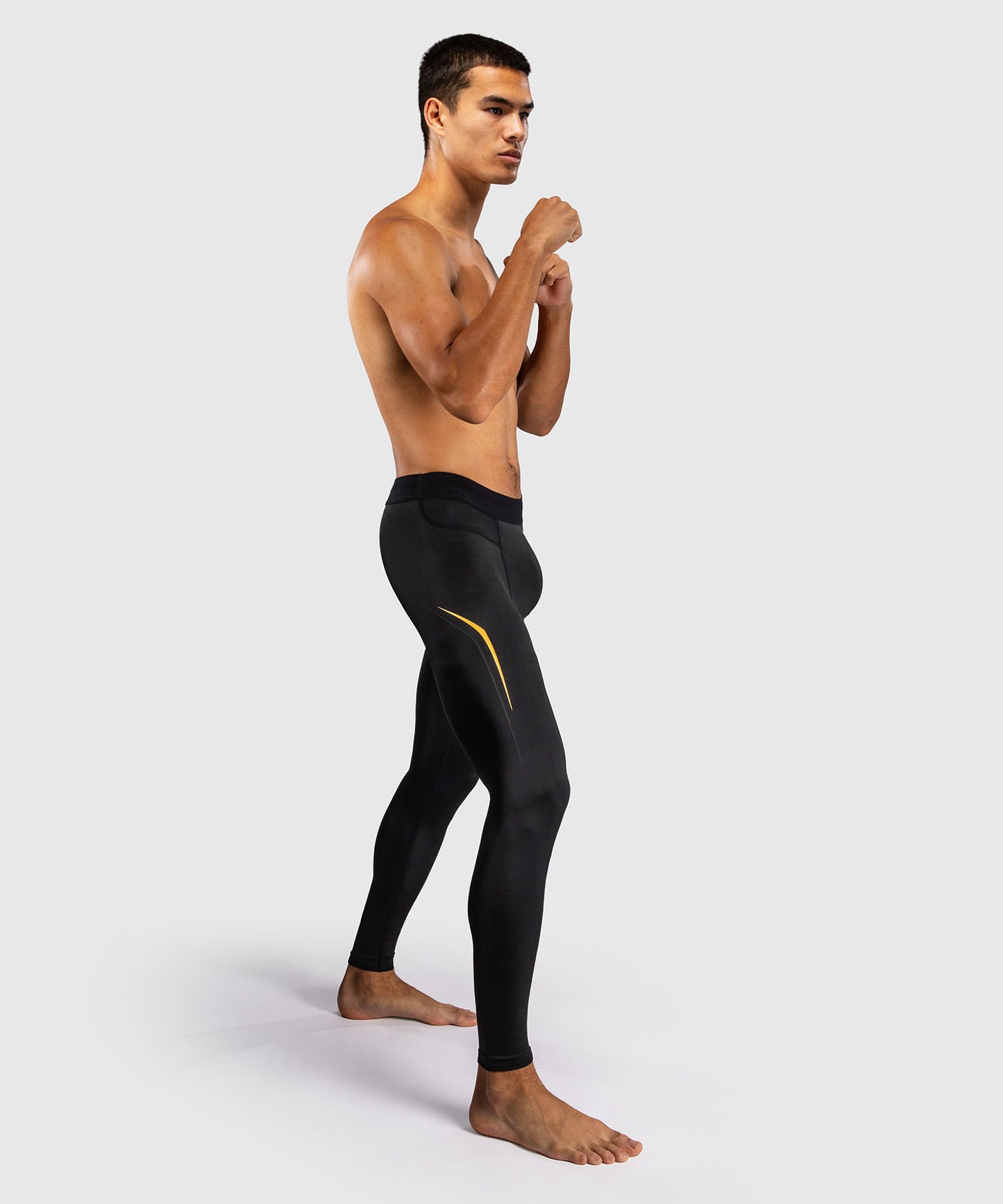 Venum G-Core Spats - Negro/Oro