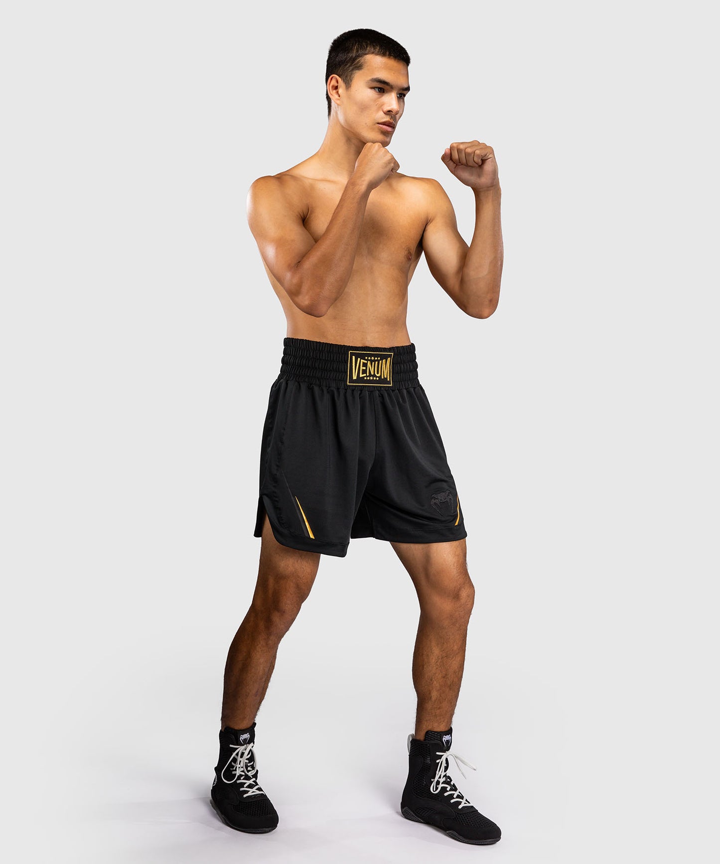 Venum G-Core Pantalón Corto de Boxeo - Negro/Oro