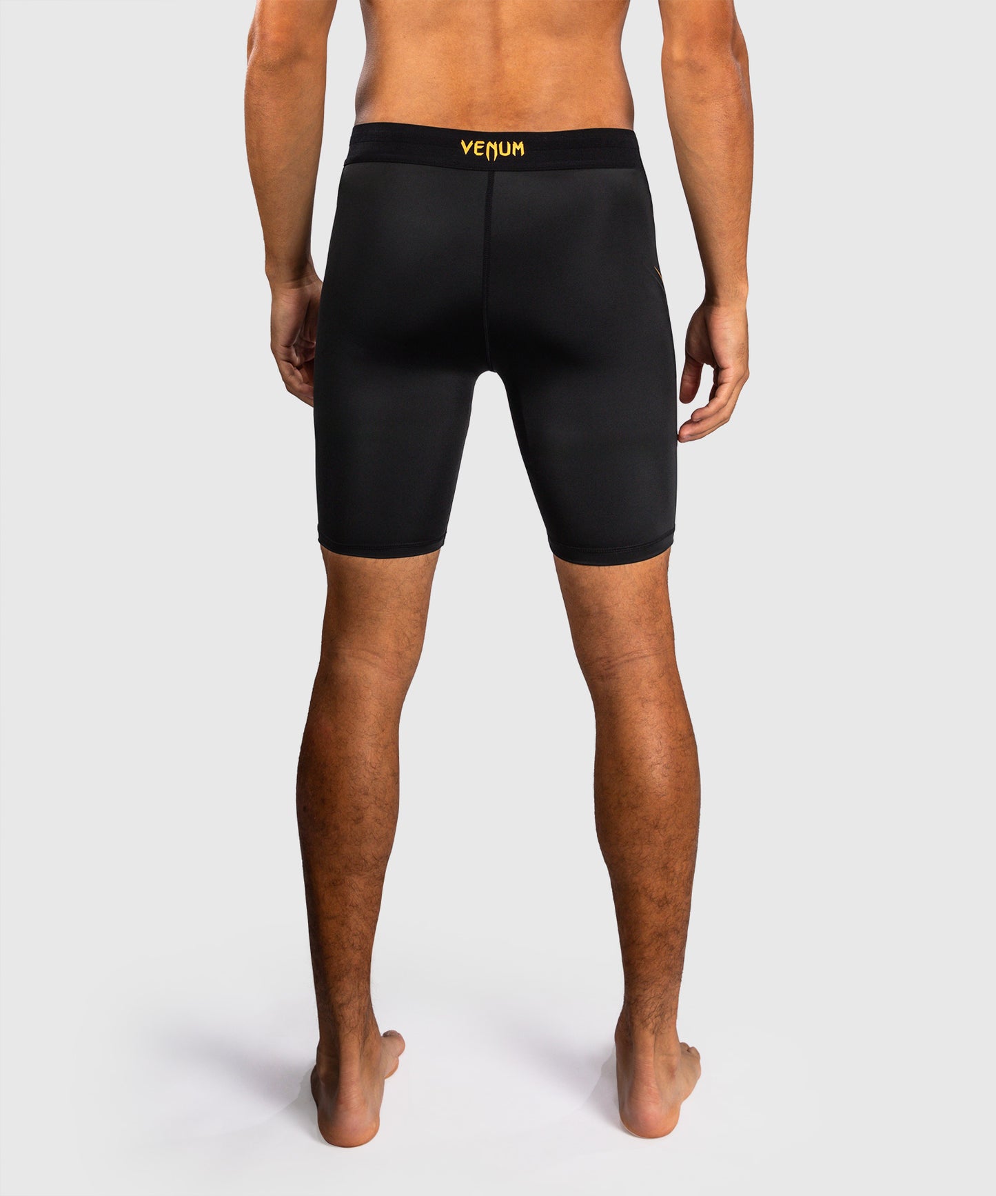 Venum G-Core Pantalón Corto de Compresión - Negro/Oro