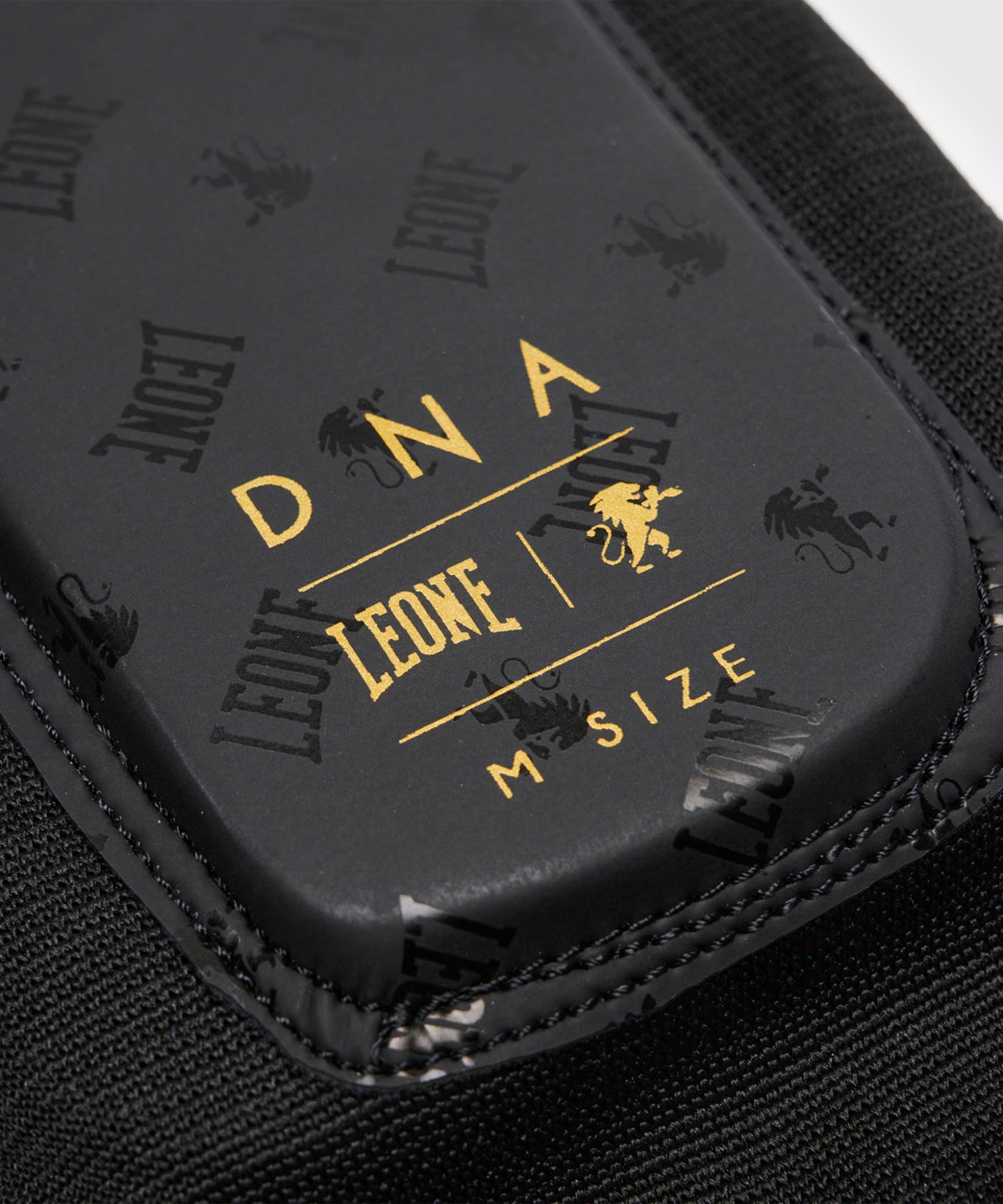 Leone DNA Espinilleras - Negro