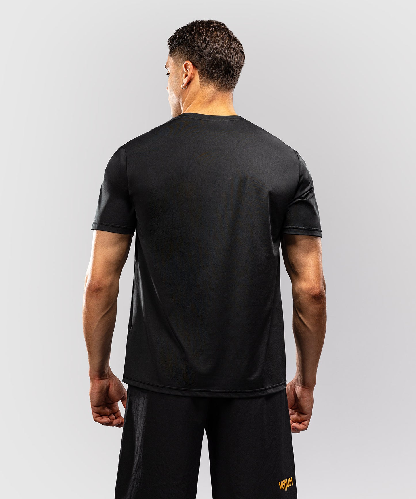 Venum Classic Camiseta Dry Tech - Negro/Dorado