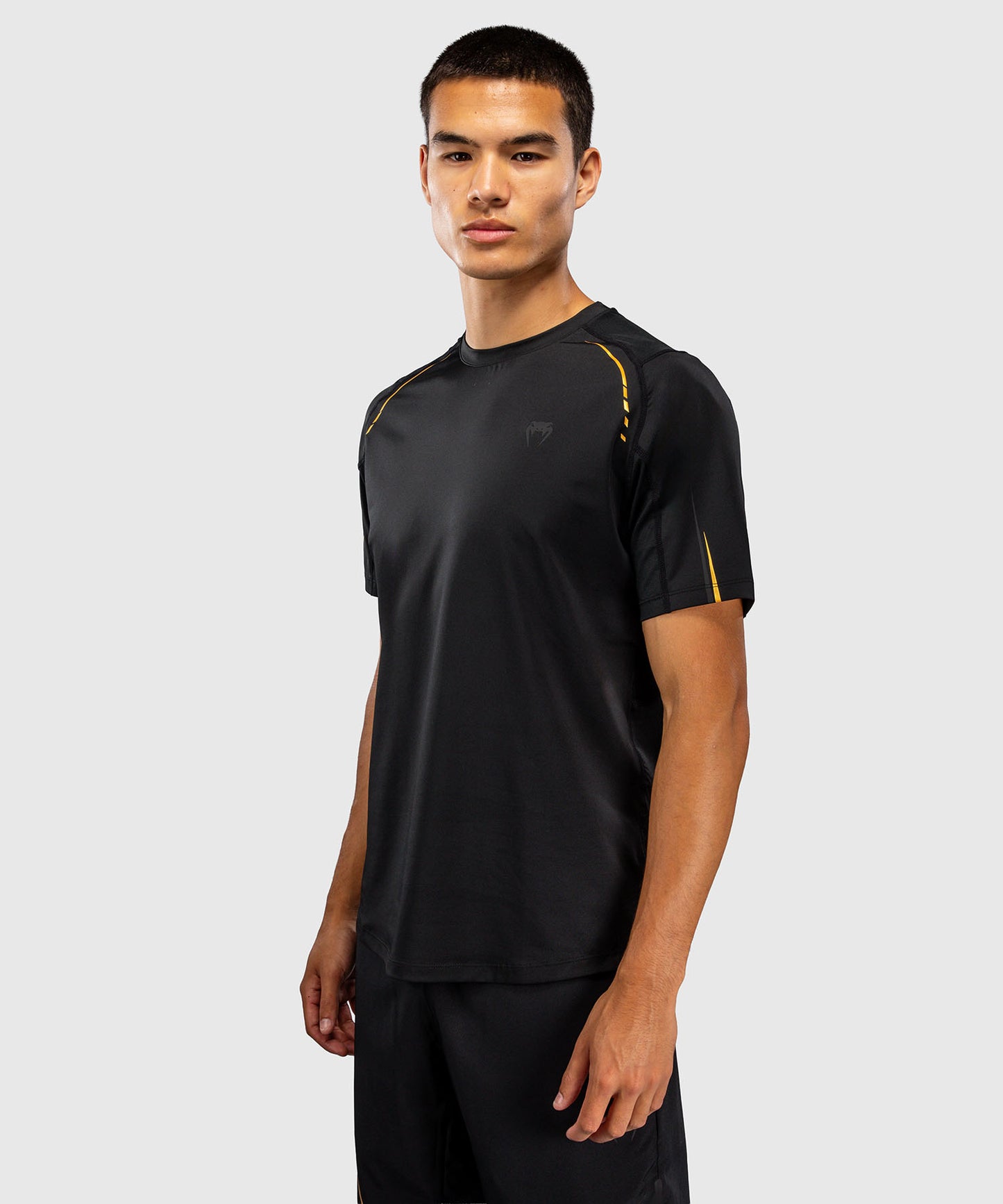 Venum G-Core Camiseta Dry Tech - Negro/Oro