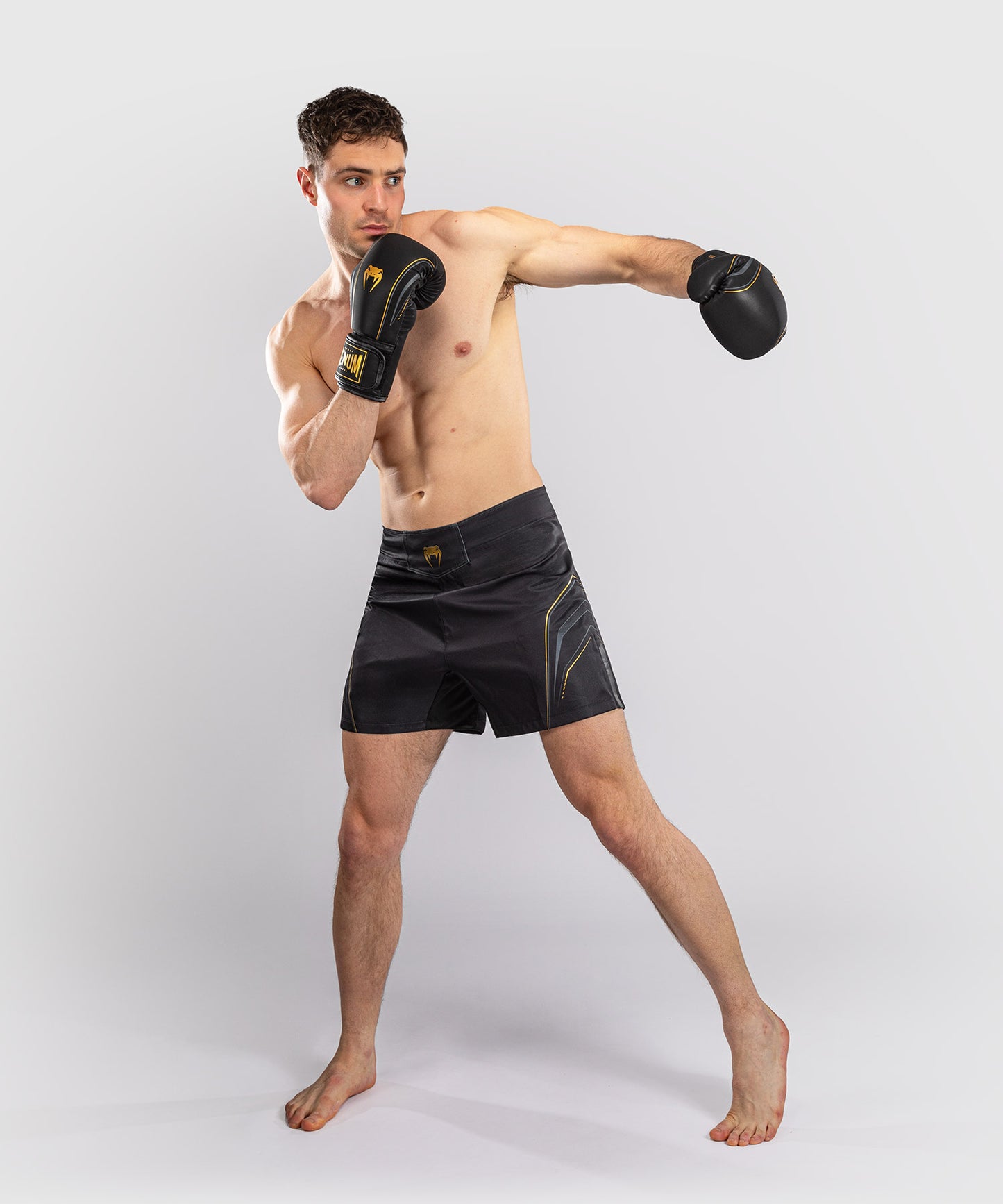 Venum Streamline Fightshorts - Black/Gold