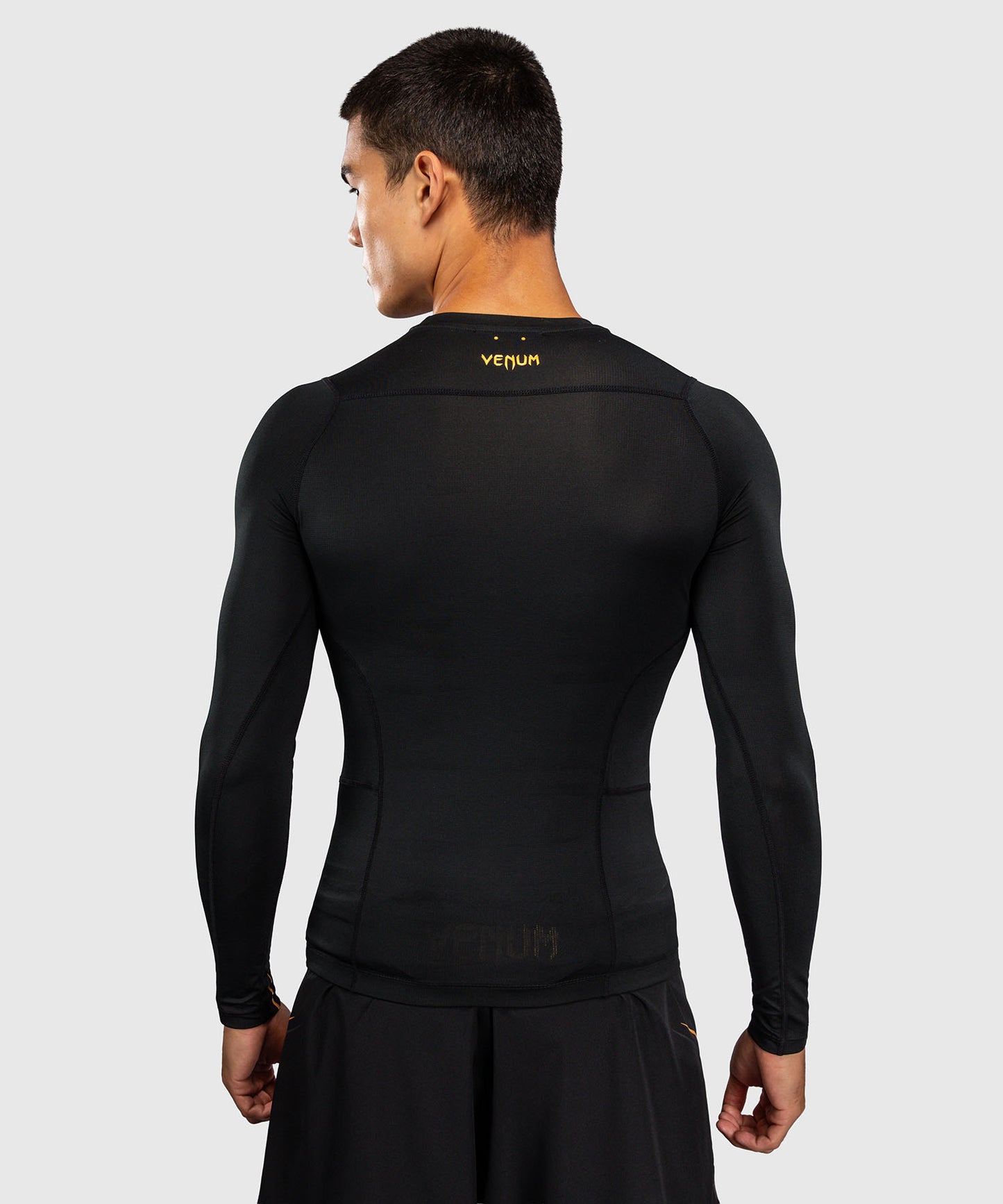Venum G-Core Rashguard Manga Larga - Negro/Oro