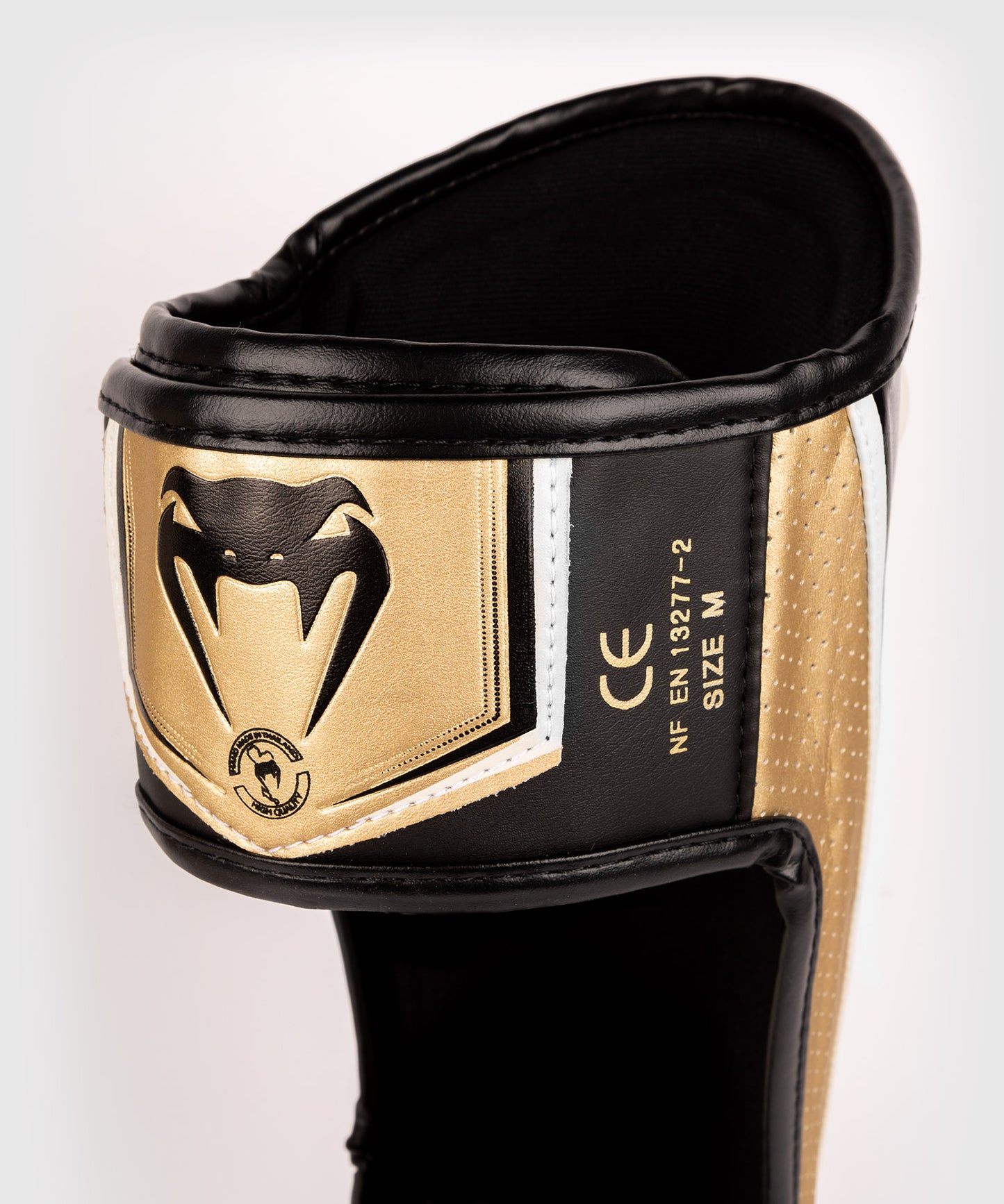 Venum Elite Evo Schienbeinschoner - Weiß/Gold