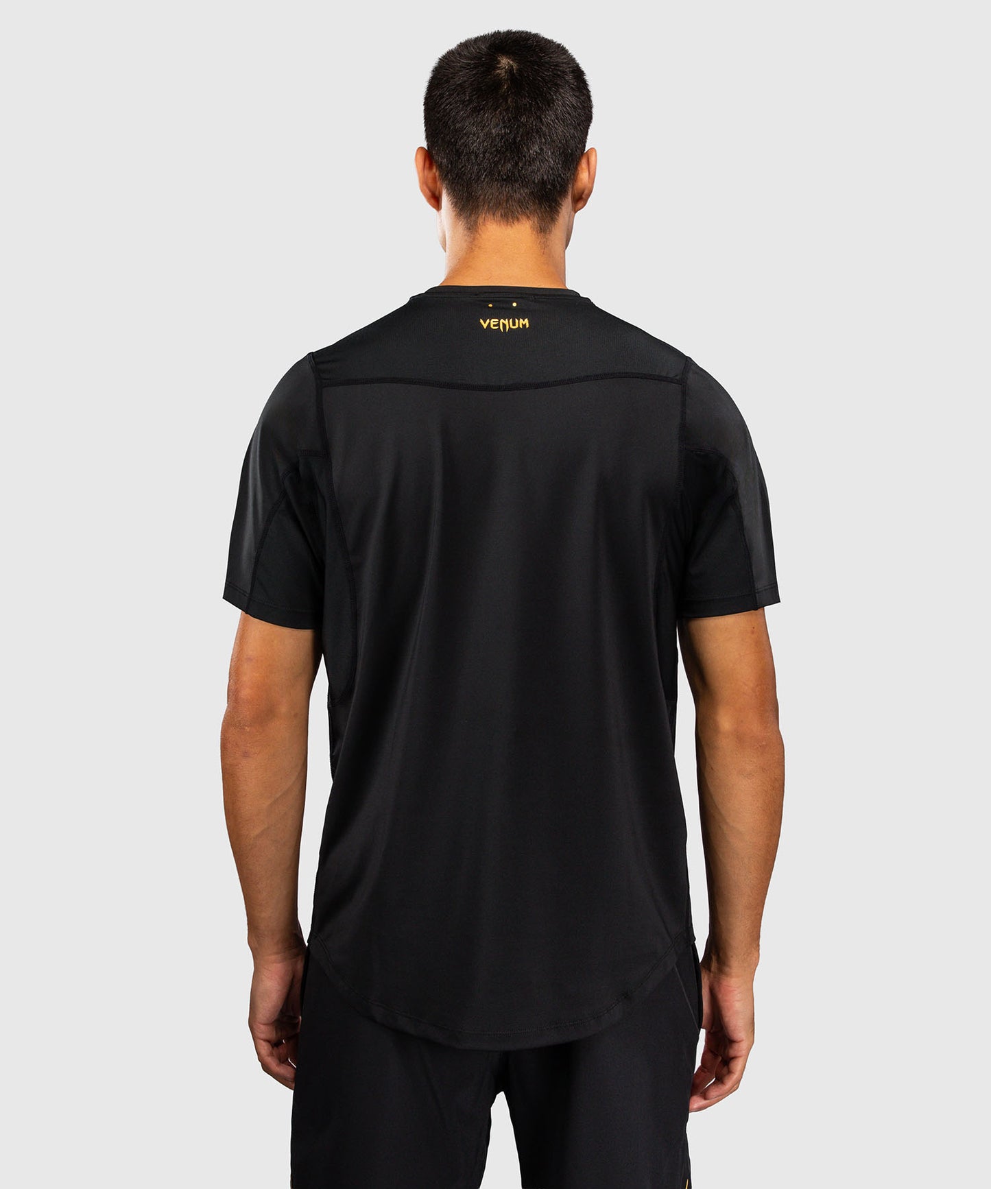 Venum G-Core Camiseta Dry Tech - Negro/Oro