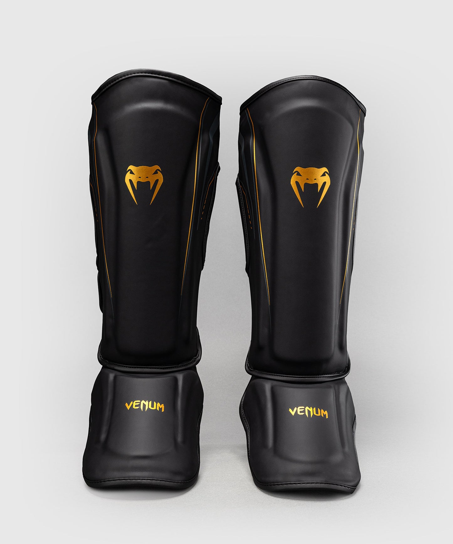Protège-tibias Venum Streamline – Noir/Or
