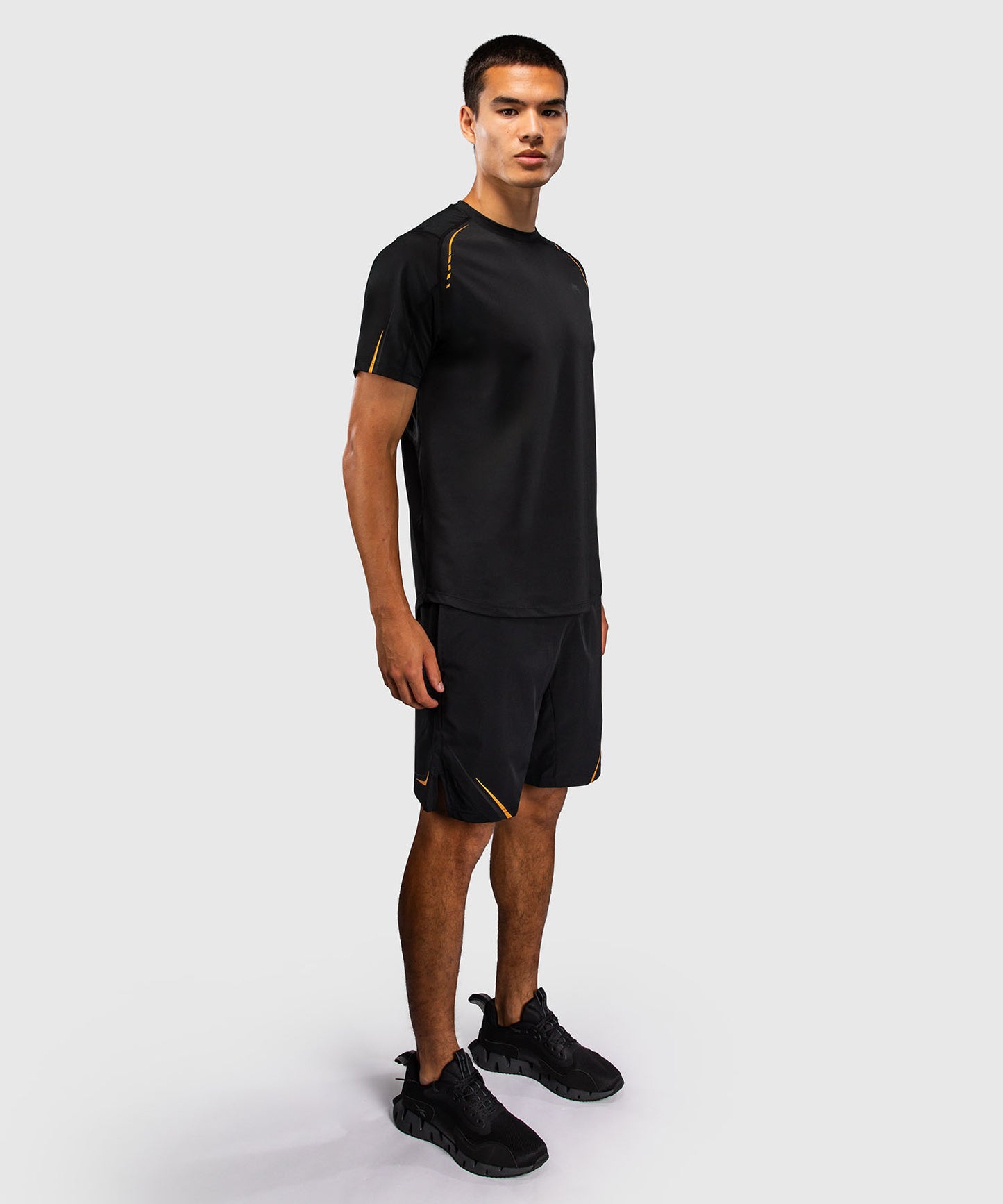 Venum G-Core Camiseta Dry Tech - Negro/Oro