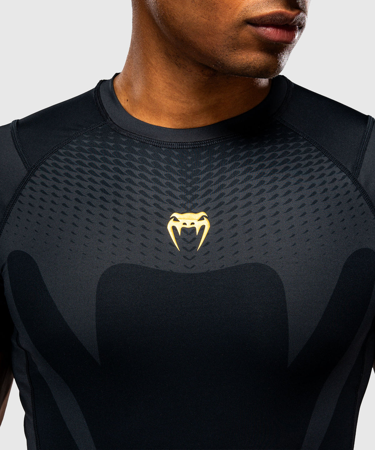 Venum Attack Kurzarm-Rashguard - Schwarz/Gold