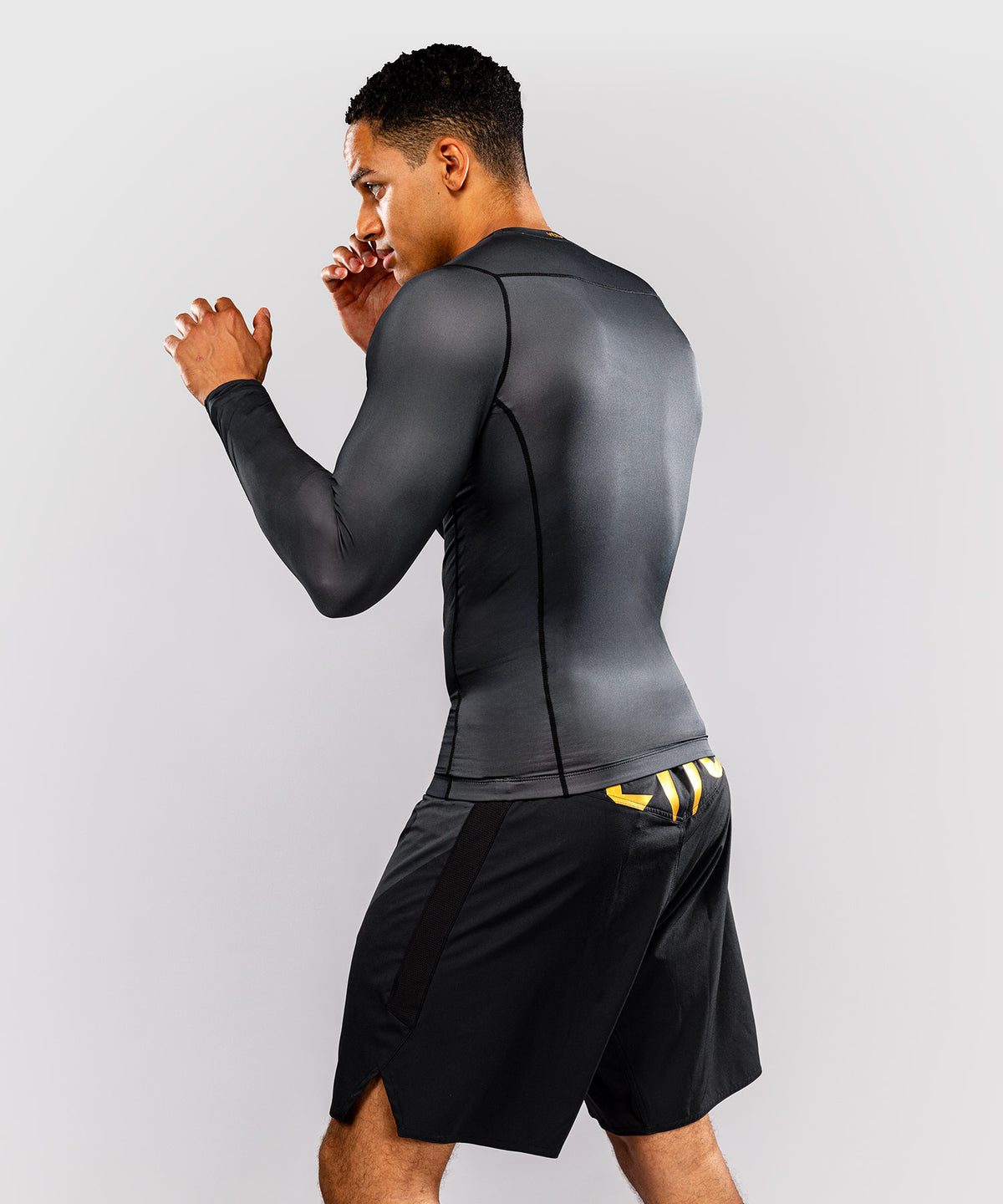 Venum Attack Langarm-Rashguard - Schwarz/Gold