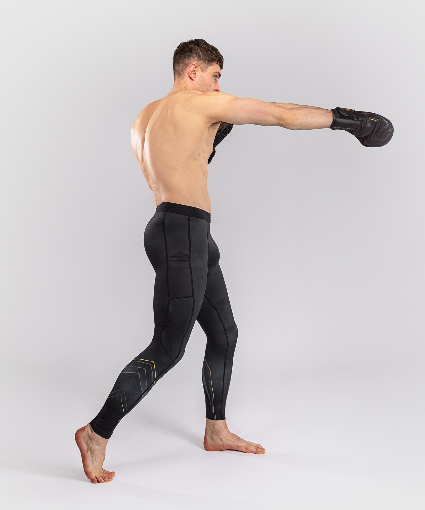 Venum Streamline Spats – Nero/Oro