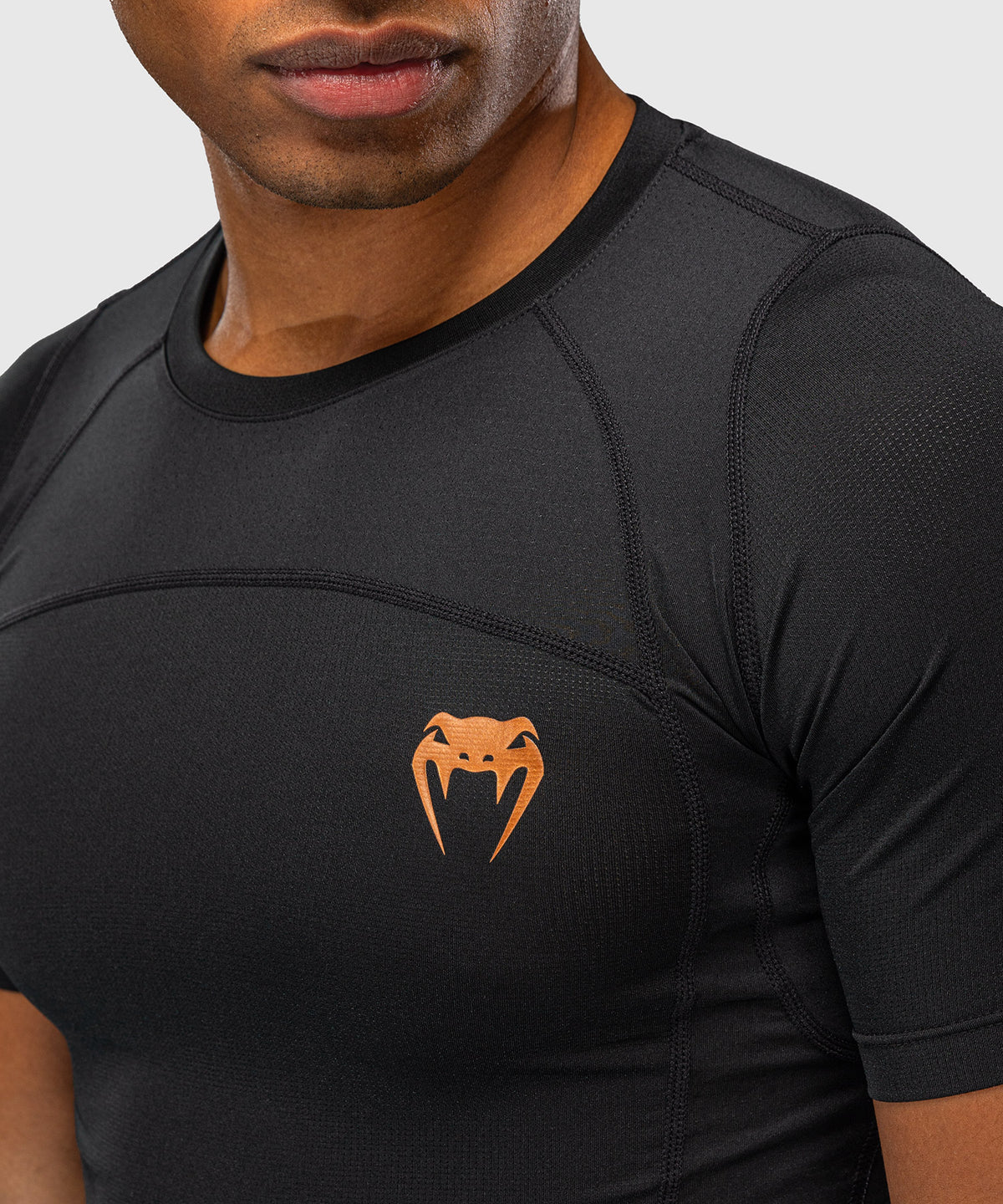 Venum G-Fit Revolution Rashguard de manga corta - Negro/Cobre