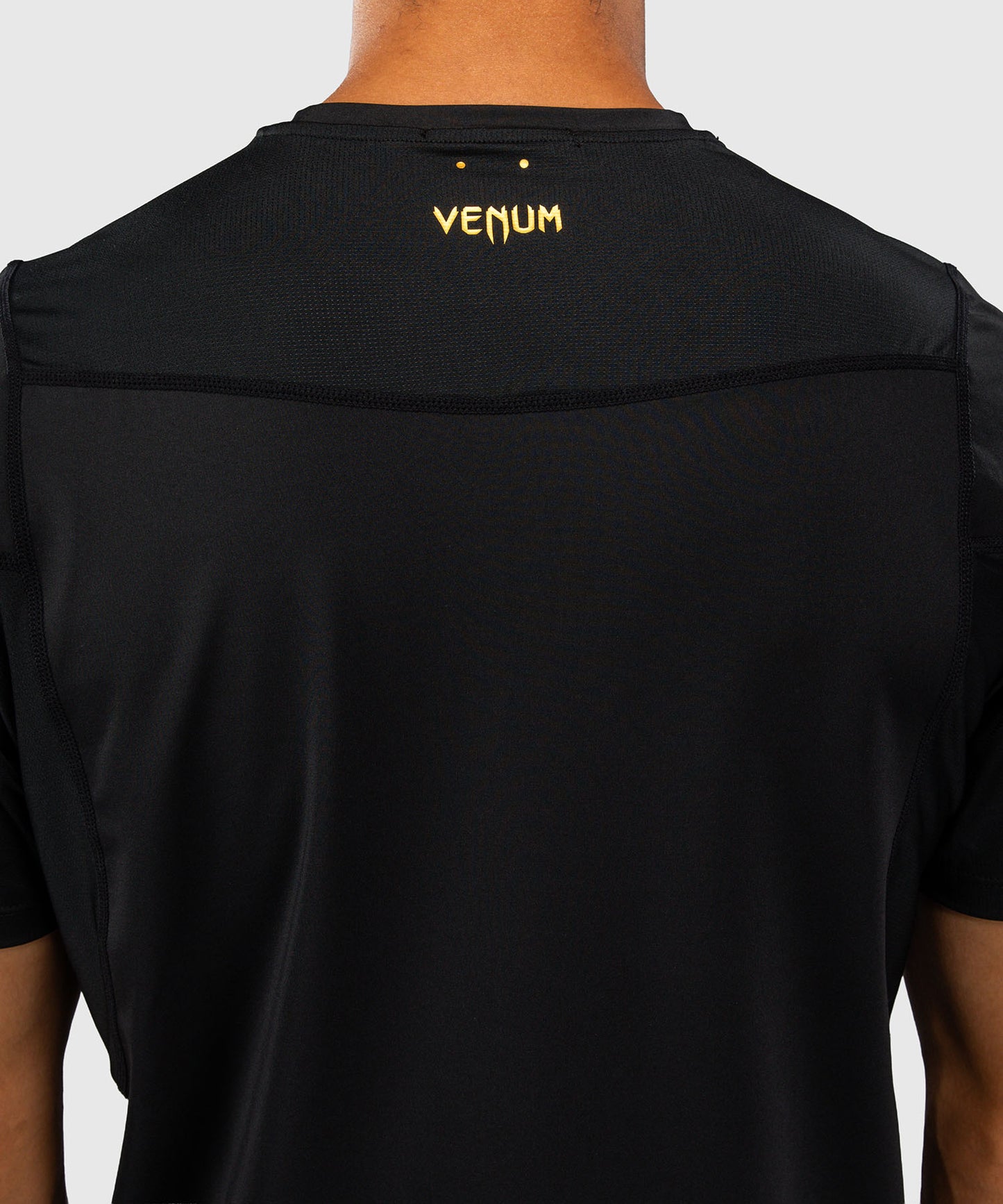Venum G-Core Camiseta Dry Tech - Negro/Oro