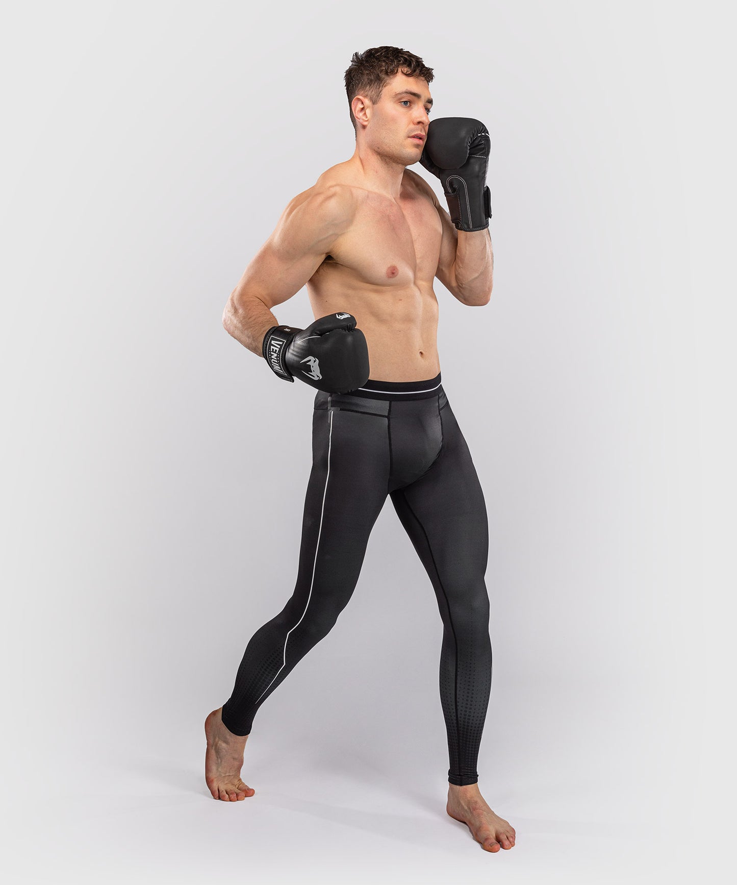 Venum Stealth Spats – Schwarz/Weiß