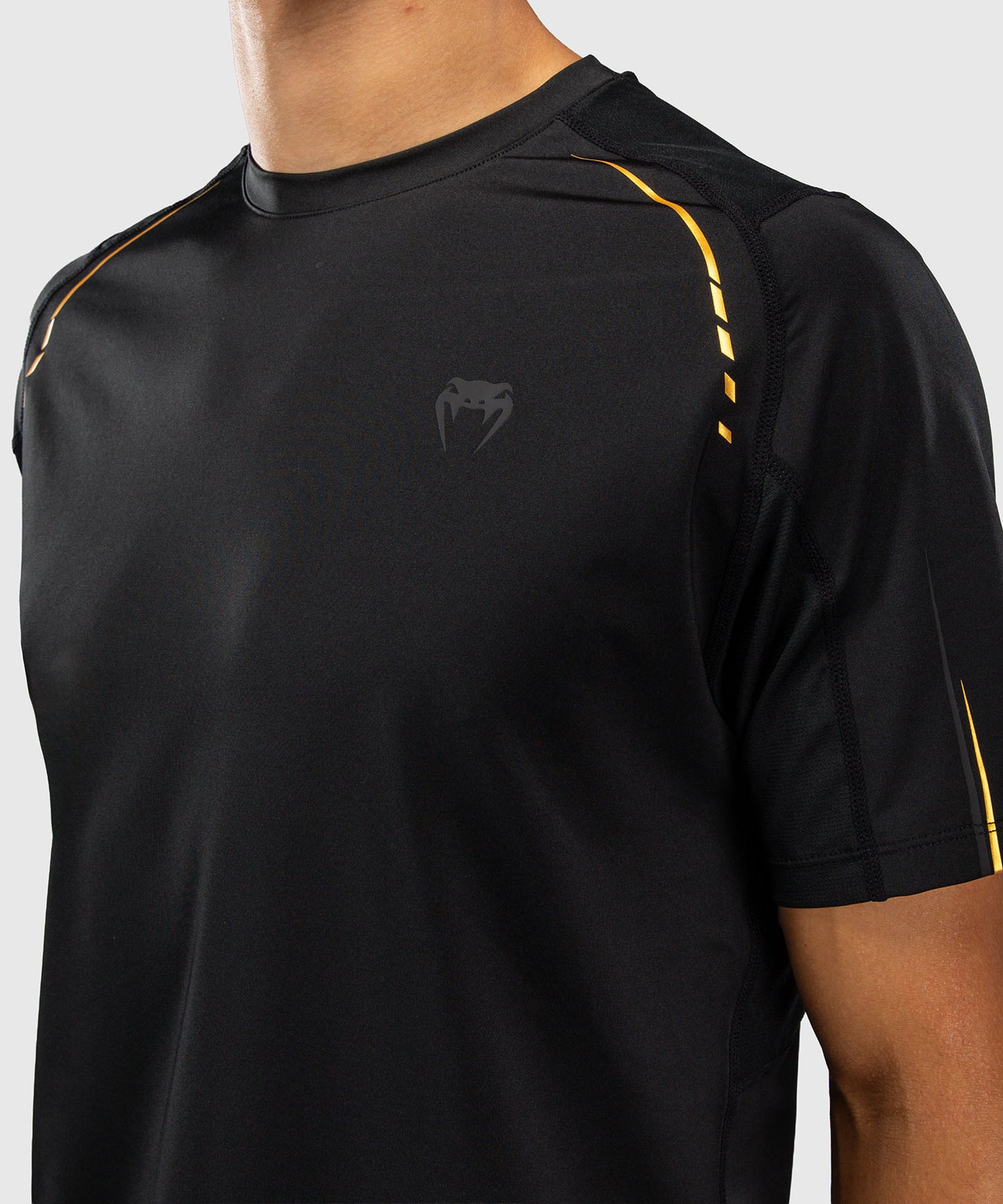 Venum G-Core Camiseta Dry Tech - Negro/Oro