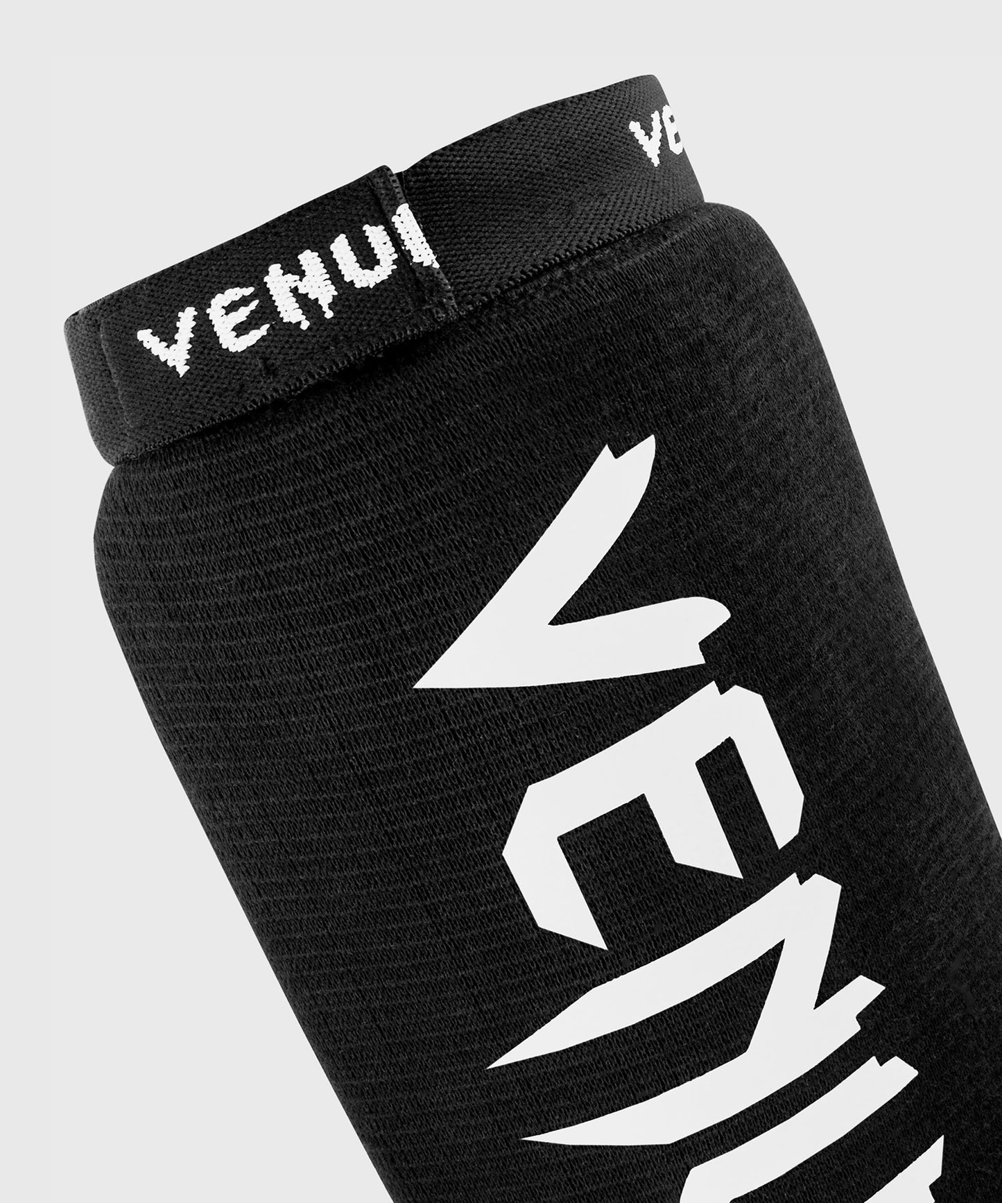 Venum Kontact Espinilleras – Negro/Blanco